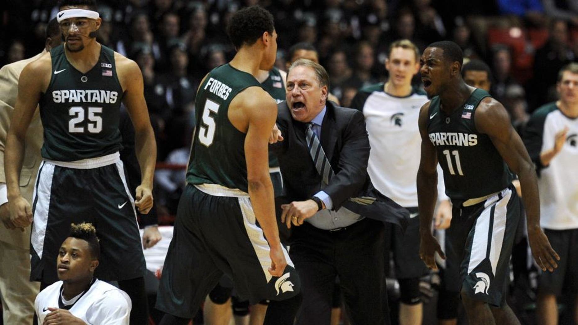 Dec 19, 2015; Boston, MA, USA; Michigan State Spartans head coach Tom Izzo reacts after a play made by guard Bryn Forbes (5) during the first half against the Northeastern Huskies at Matthews Arena. Mandatory Credit: Bob DeChiara-USA TODAY Sports