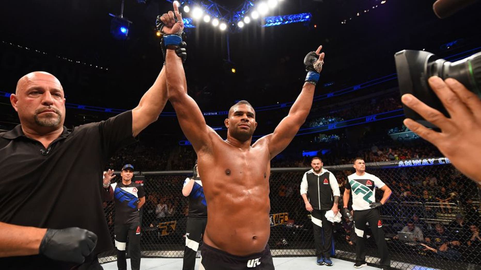 ORLANDO, FL - DECEMBER 19: Alistair Overeem celebrates his TKO victory over Junior dos Santos in their heavyweight bout during the UFC Fight Night event at the Amway Center on December 19, 2015 in Orlando, Florida. (Photo by Josh Hedges/Zuffa LLC/Zuffa LLC via Getty Images)