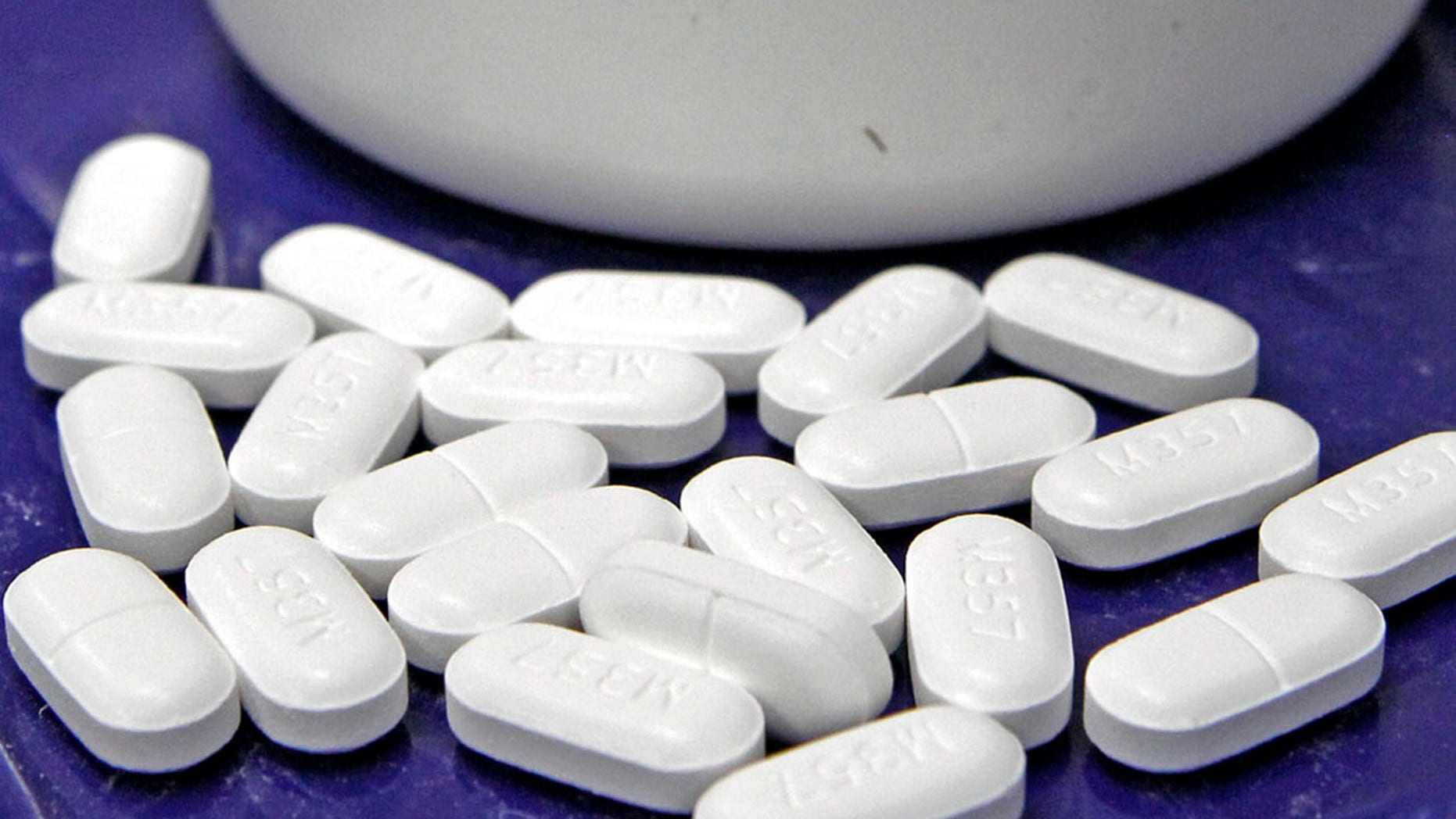 FILE - This Feb. 19, 2013, file photo shows pills of the painkiller hydrocodone at a pharmacy in Montpelier, Vt.