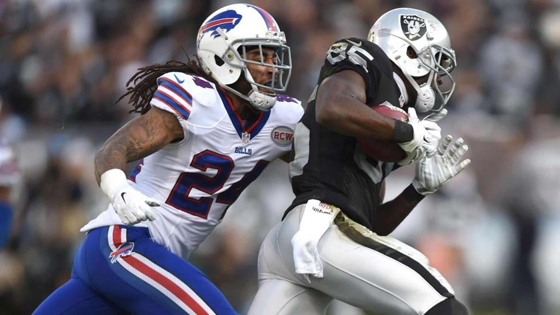 OAKLAND, CA - DECEMBER 21: Stephon Gilmore #24 of the Buffalo Bills chases Kenbrell Thompkins #85 of the Oakland Raiders in the fourth quarter at O.co Coliseum on December 21, 2014 in Oakland, California. (Photo by Thearon W. Henderson/Getty Images)