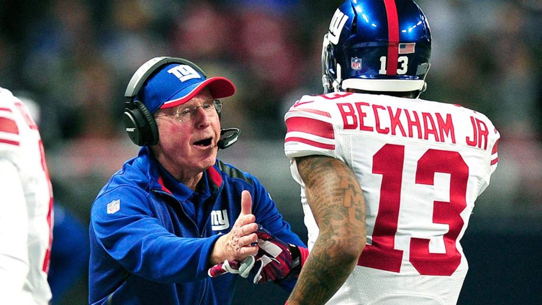 Dec 21, 2014; St. Louis, MO, USA; New York Giants head coach Tom Coughlin celebrates with wide receiver Odell Beckham (13) after a touchdown against the St. Louis Rams during the first half at the Edward Jones Dome. Mandatory Credit: Jeff Curry-USA TODAY Sports