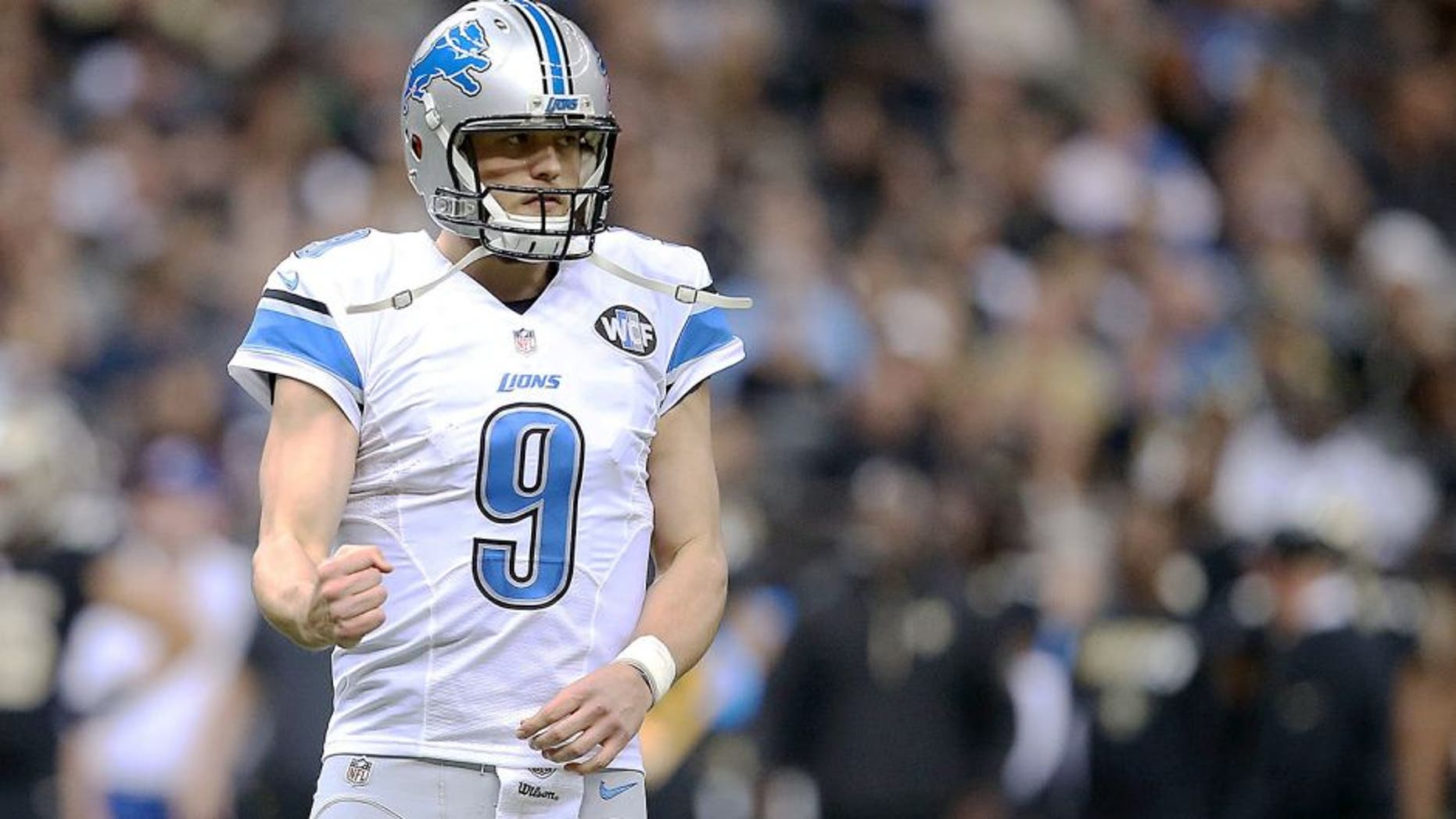 NEW ORLEANS, LA - DECEMBER 21: Matthew Stafford #9 of the Detroit Lions reacts to a touchdown during the second quarter of a game against the New Orleans Saints at the Mercedes-Benz Superdome on December 21, 2015 in New Orleans, Louisiana. (Photo by Sean Gardner/Getty Images)