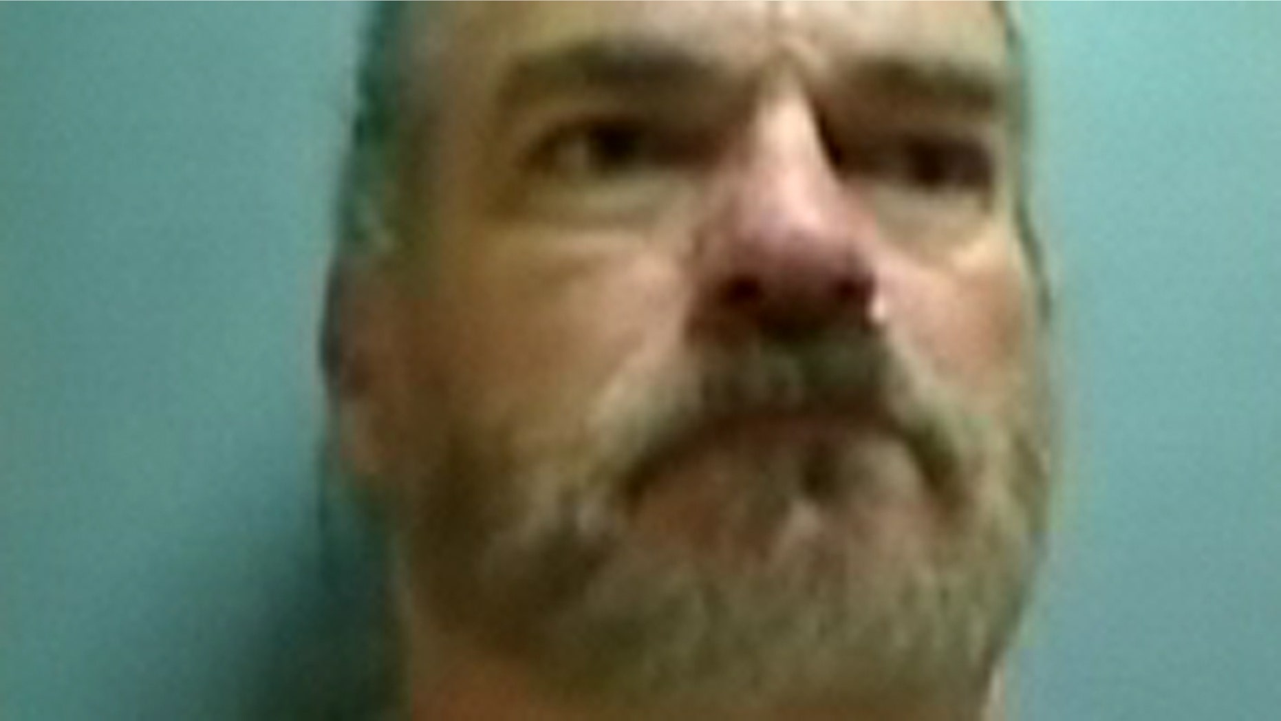 January 22, 2012: This photo shows murder suspect Thomas Taunton.