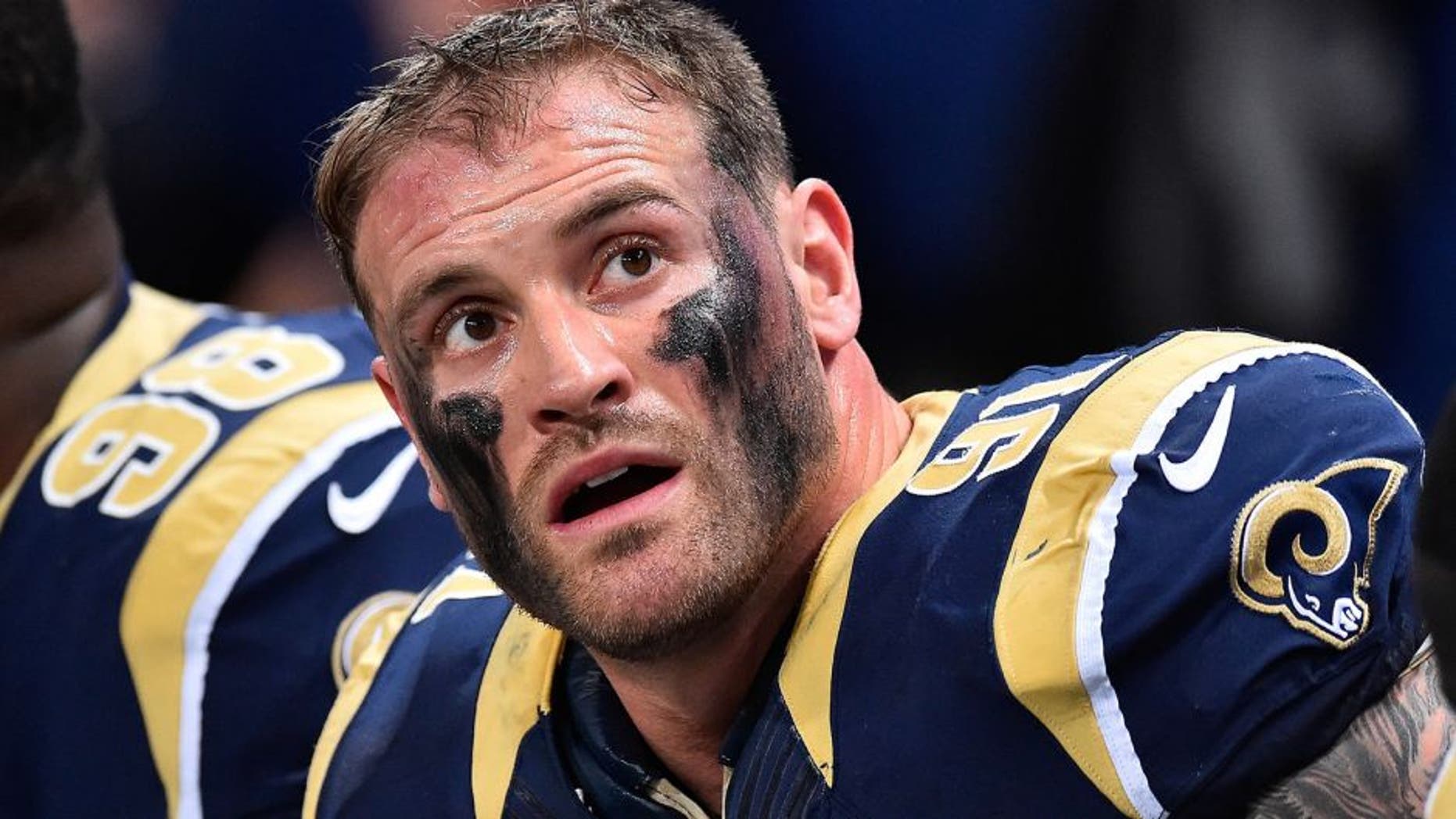 Dec 11, 2014; St. Louis, MO, USA; St. Louis Rams defensive end Chris Long (91) looks up during the first half against the Arizona Cardinals at the Edward Jones Dome. Mandatory Credit: Jasen Vinlove-USA TODAY Sports