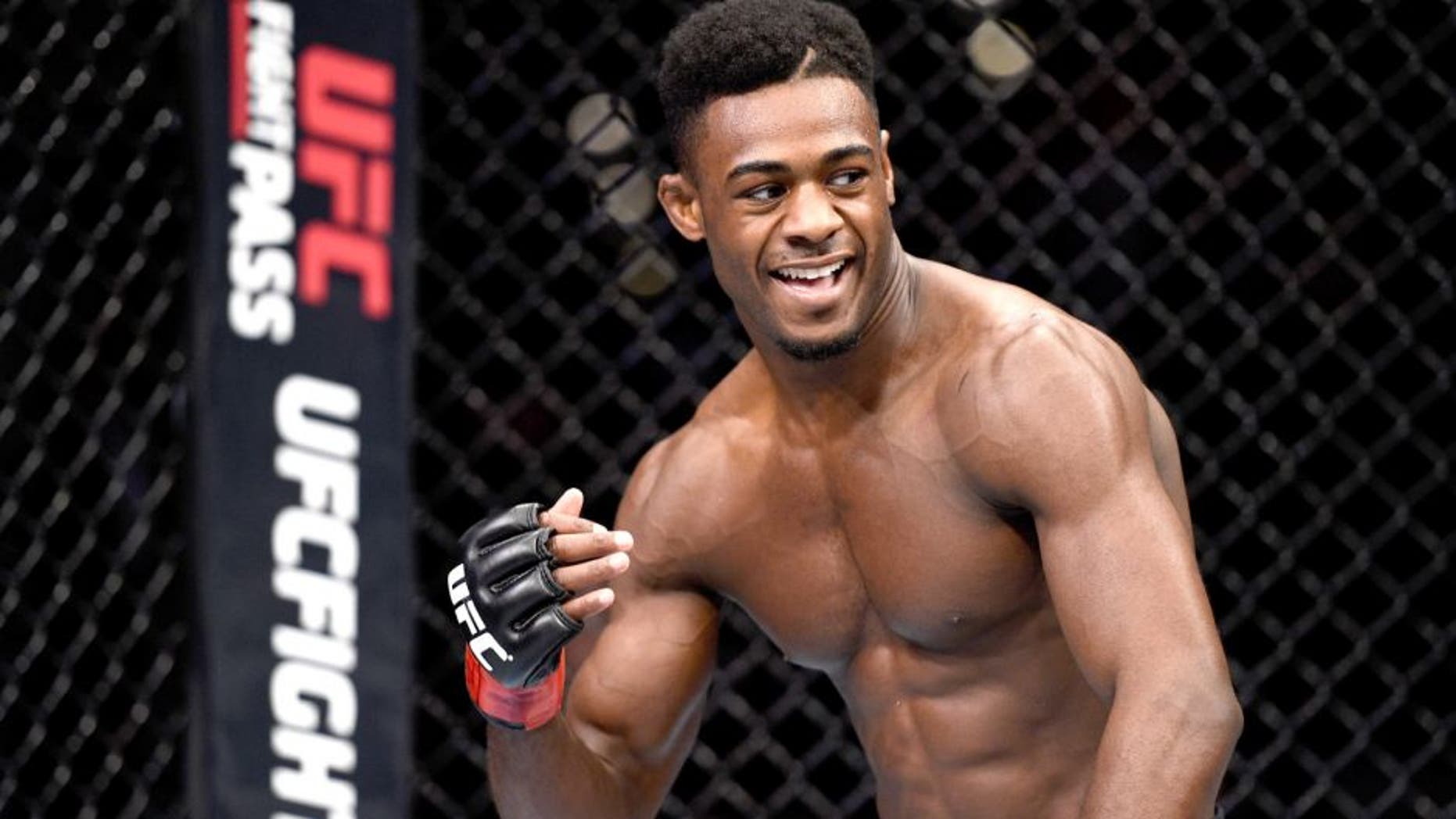 LAS VEGAS, NEVADA - DECEMBER 10: Aljamain Sterling celebrates his win over Johnny Eduardo in their bantamweight bout during the UFC Fight Night event at The Chelsea at the Cosmopolitan of Las Vegas on December 10, 2015 in Las Vegas, Nevada. (Photo by Jeff Bottari/Zuffa LLC/Zuffa LLC via Getty Images)