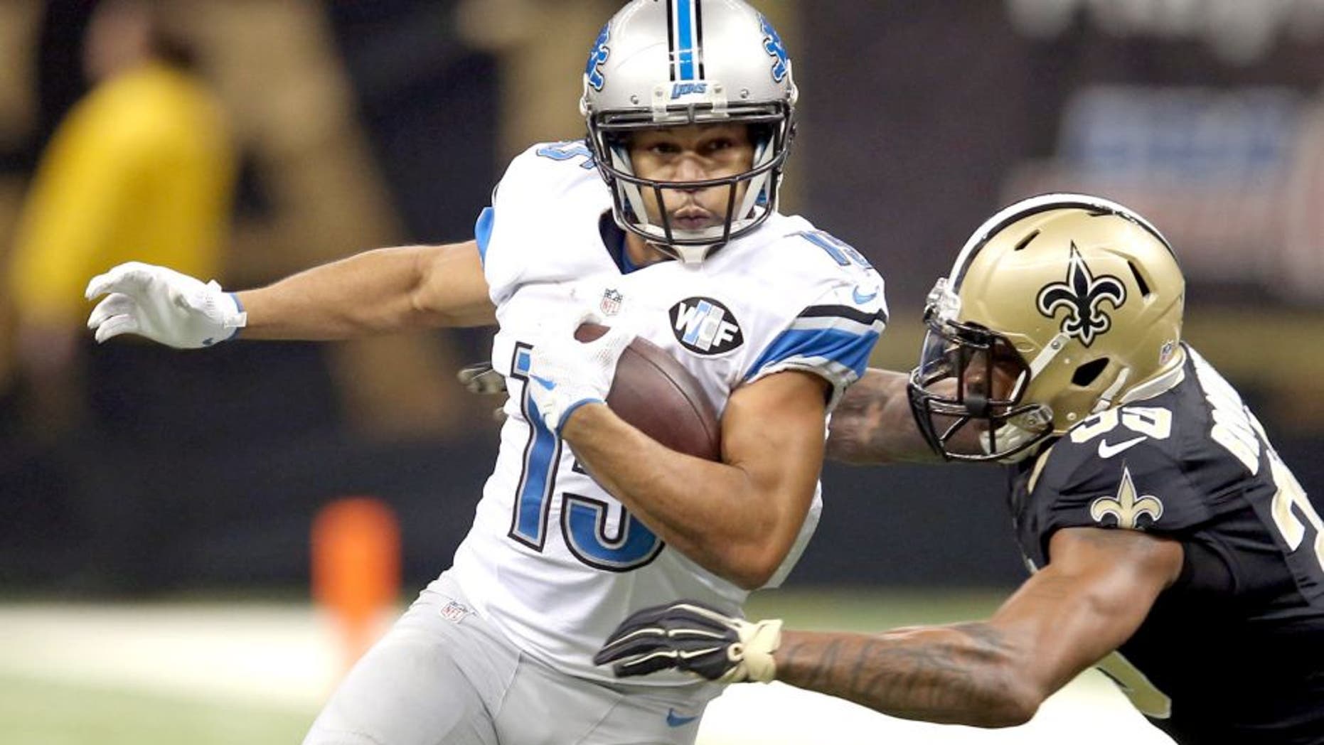 Dec 21, 2015; New Orleans, LA, USA; Detroit Lions wide receiver Golden Tate (15) is tackled by New Orleans Saints cornerback Brandon Browner (39) in the first quarter of the game at the Mercedes-Benz Superdome. Mandatory Credit: Chuck Cook-USA TODAY Sports