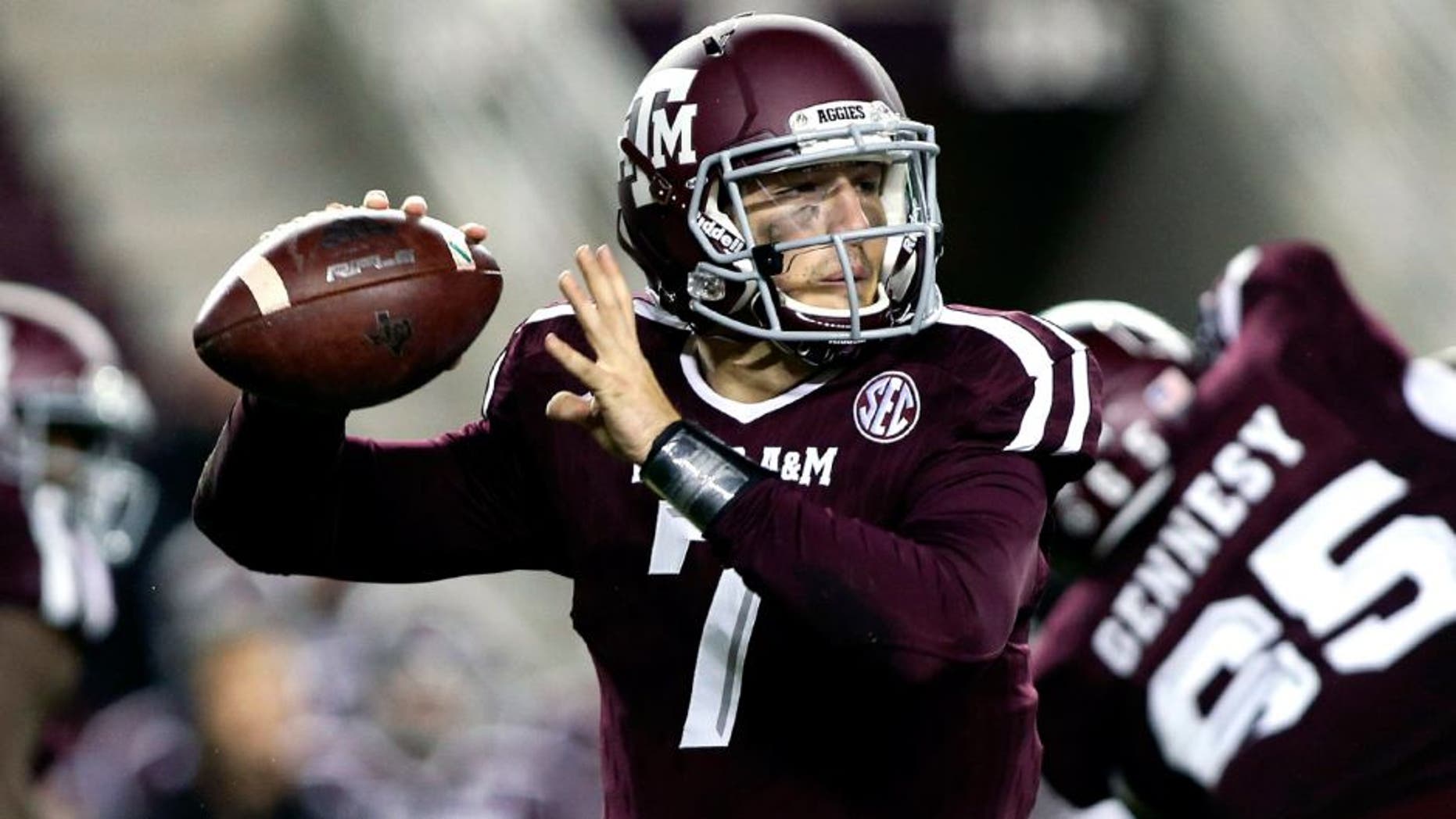Nov 7, 2015; College Station, TX, USA; Texas A&M Aggies quarterback Jake Hubenak (7) looks for an open receiver during the fourth quarter against the Auburn Tigers at Kyle Field. The Tigers defeated the Aggies 26-10. Mandatory Credit: Troy Taormina-USA TODAY Sports