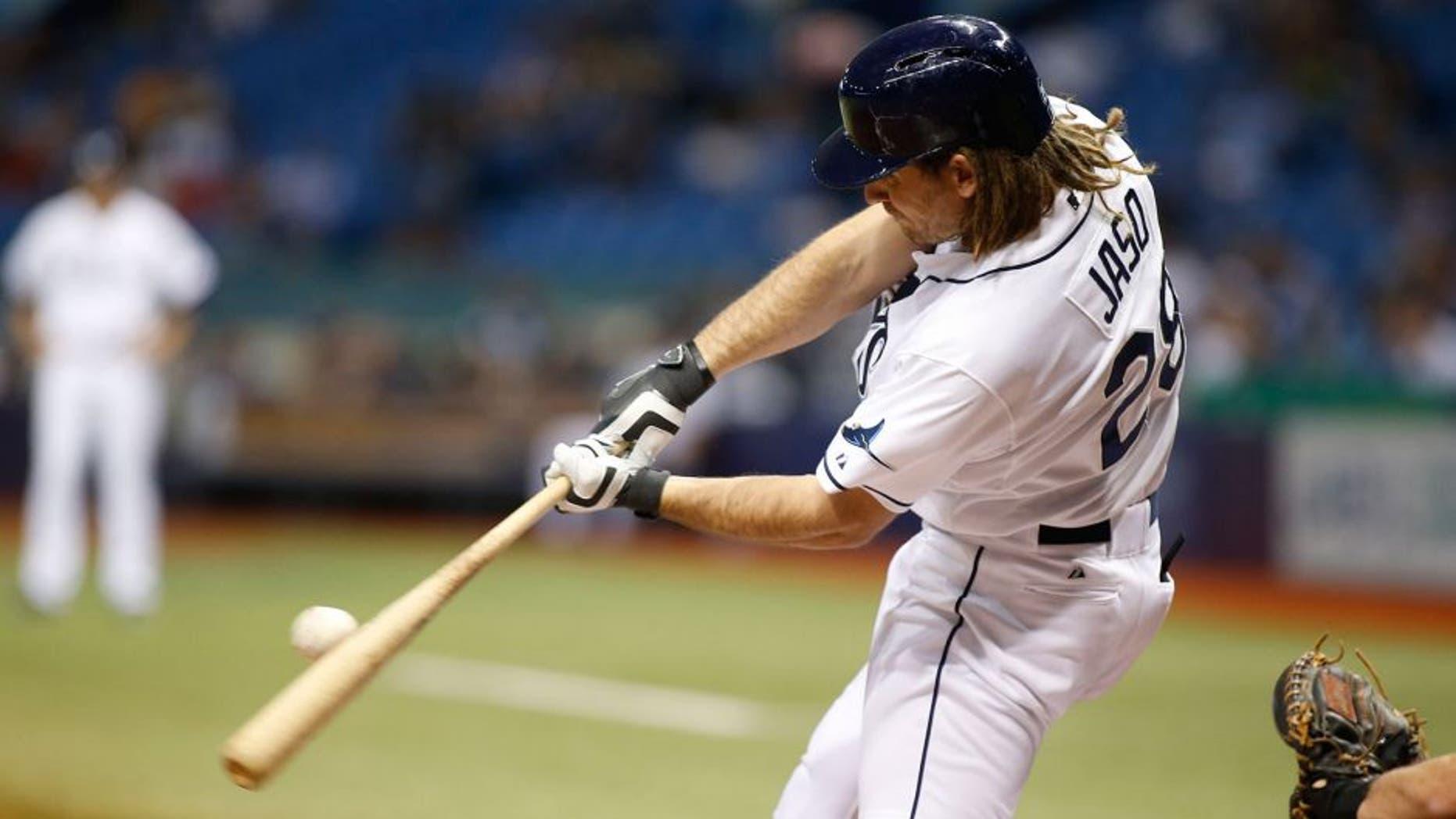ST. PETERSBURG, FL - OCTOBER 1: John Jaso #28 of the Tampa Bay Rays hits a single to right field off of pitcher Jose Fernandez #16 of the Miami Marlins during the third inning of a game on October 1, 2015 at Tropicana Field in St. Petersburg, Florida. (Photo by Brian Blanco/Getty Images)