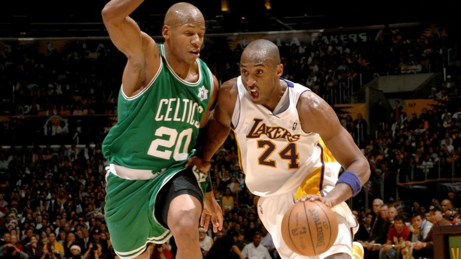 LOS ANGELES - DECEMBER 25: Kobe Bryant #24 of the Los Angeles Lakers dribbles to the basket against Ray Allen #20 of the Boston Celtics at Staples Center on December 25, 2008 in Los Angeles, California. NOTE TO USER: User expressly acknowledges and agrees that, by downloading and/or using this Photograph, user is consenting to the terms and conditions of the Getty Images License Agreement. Mandatory Copyright Notice: Copyright 2008 NBAE (Photo by Noah Graham/NBAE via Getty Images)
