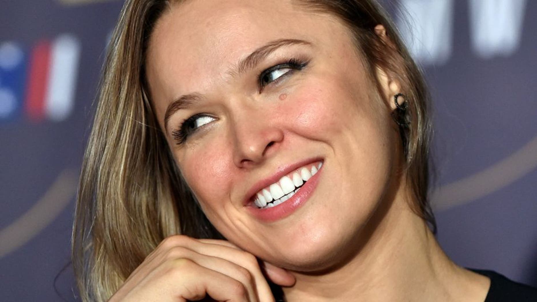 Ronda Rousey of the US talks to the press before a face-off for the UFC fight in Melbourne on November 13, 2015. Over 55,000 are expected to attend the UFC fight between Rousey and compatriot Holly Holm in Melbourne on November 15. RESTRICTED TO EDITORIAL USE NO ADVERTISING USE NO PROMOTIONAL USE NO MERCHANDISING USE AFP PHOTO/Paul CROCK (Photo credit should read PAUL CROCK/AFP/Getty Images)