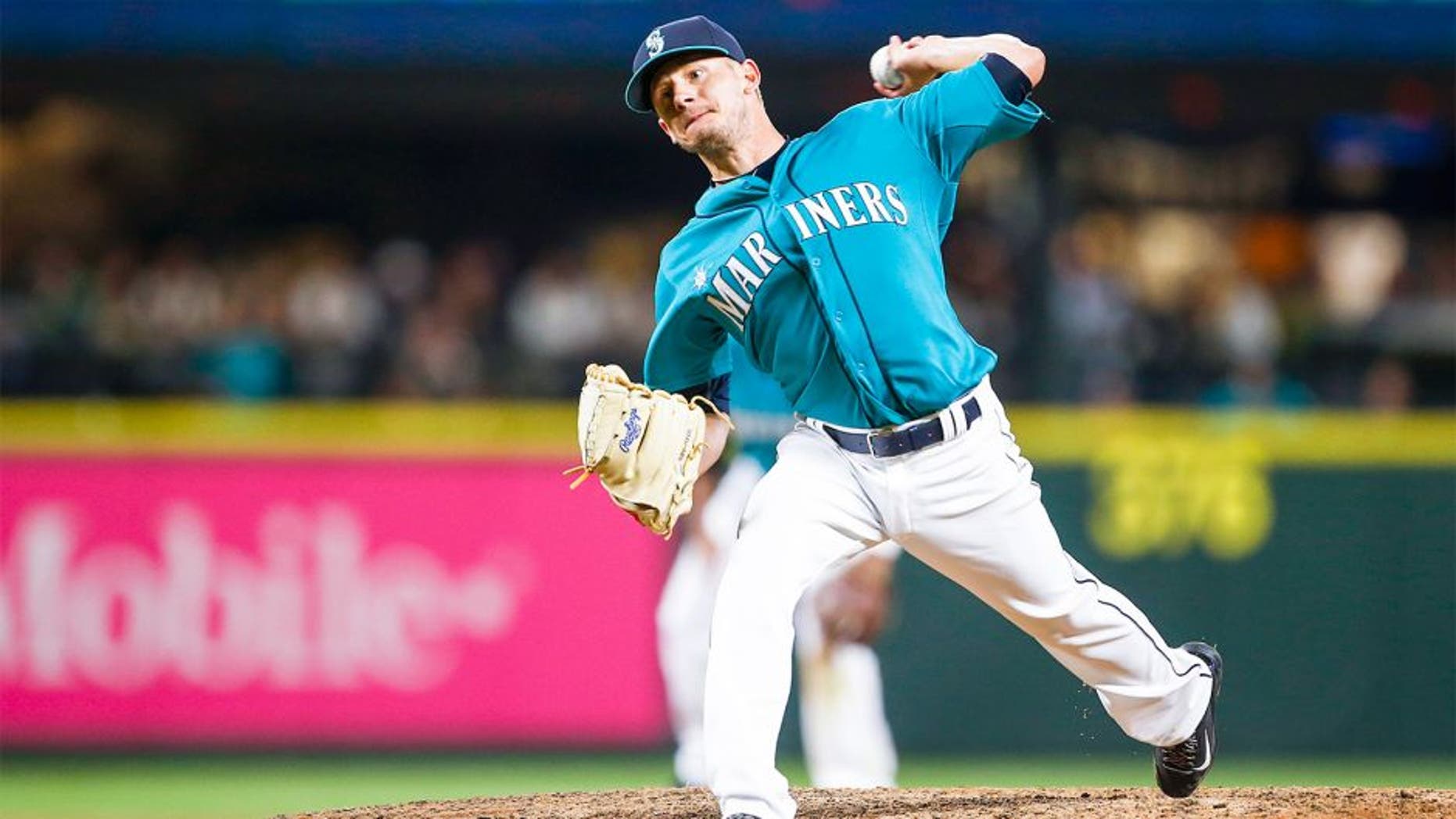Aug 21, 2015; Seattle, WA, USA; Seattle Mariners pitcher Rob Rasmussen (50) throws the ball against the Chicago White Sox during the eighth inning at Safeco Field. Mandatory Credit: Joe Nicholson-USA TODAY Sports