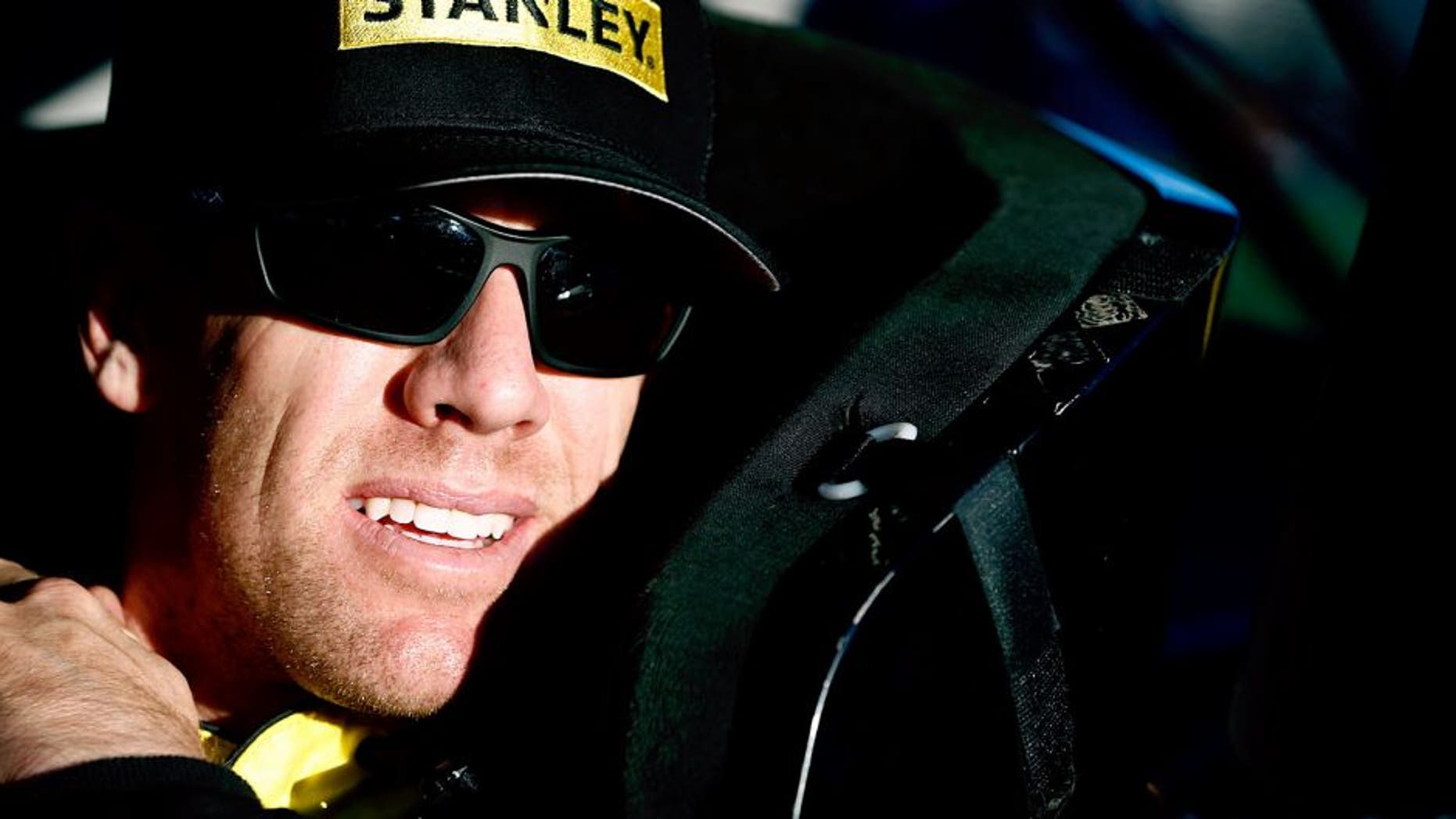 AVONDALE, AZ - NOVEMBER 13: Carl Edwards, driver of the #19 Stanley Toyota, sits in his car during qualifying for the NASCAR Sprint Cup Series Quicken Loans Race for Heroes 500 at Phoenix International Raceway on November 13, 2015 in Avondale, Arizona. (Photo by Jeff Zelevansky/NASCAR via Getty Images)