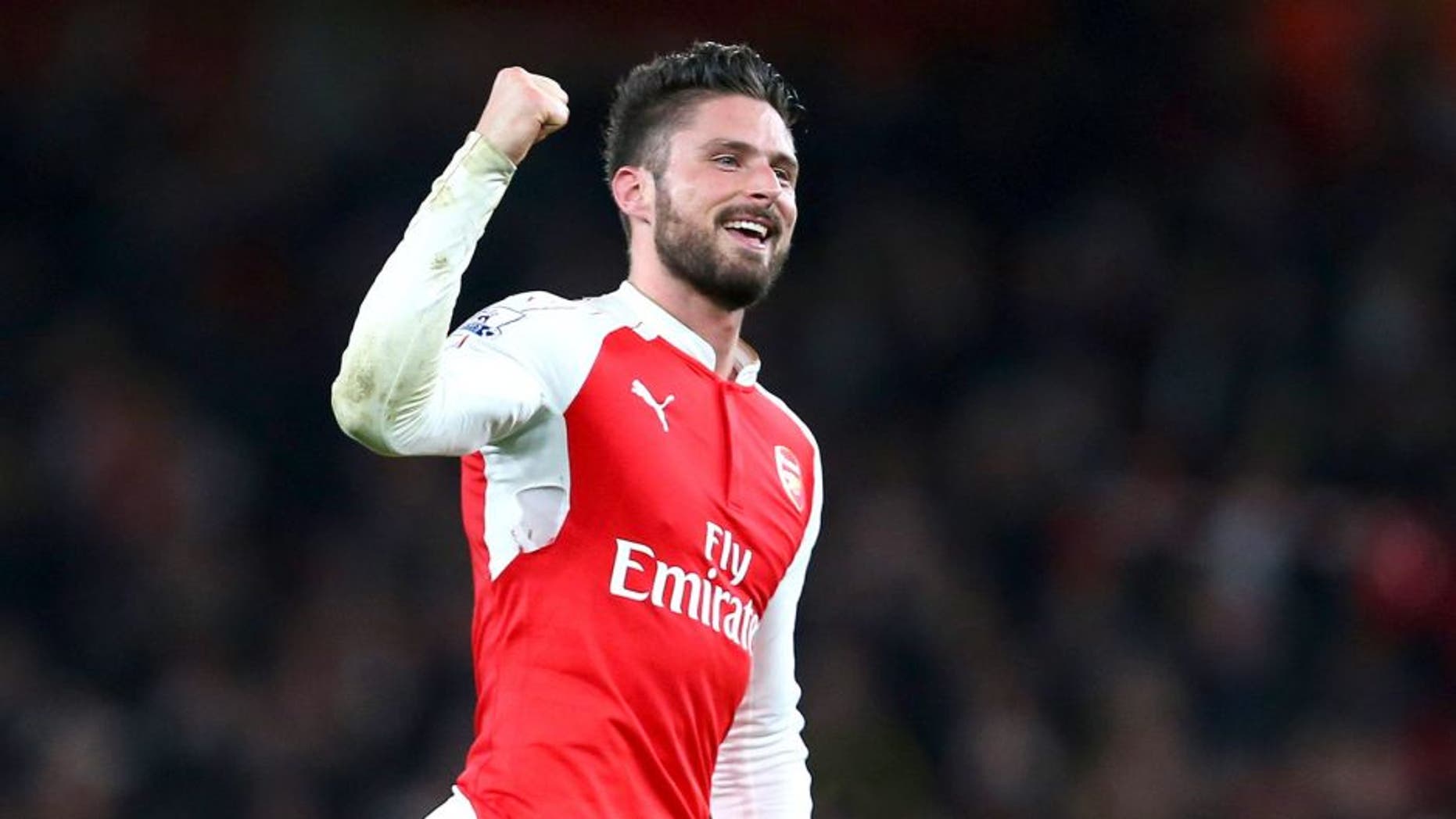 LONDON, ENGLAND - DECEMBER 21: Olivier Giroud of Arsenal celebrates after the Barclays Premier League match between Arsenal and Manchester City at the Emirates Stadium on December 21, 2015 in London, England. (Photo by Catherine Ivill - AMA/Getty Images)