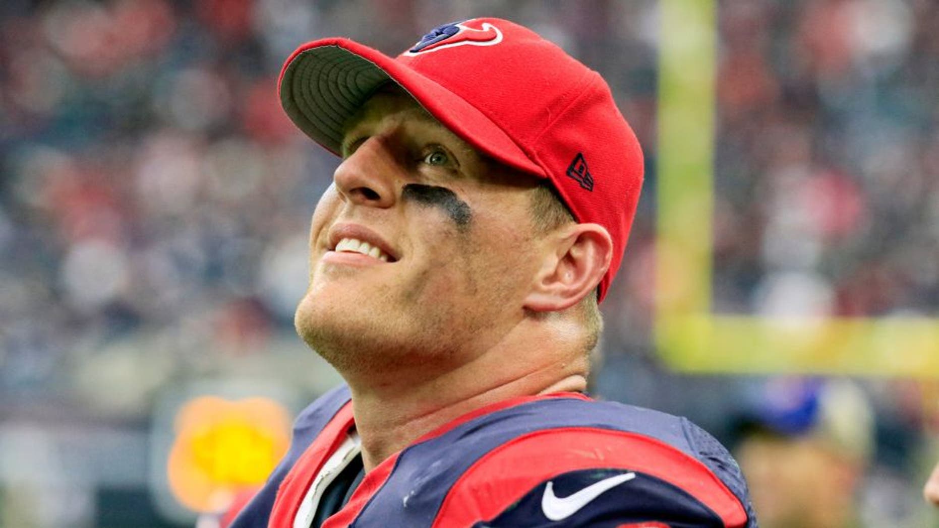Nov 22, 2015; Houston, TX, USA; Houston Texans defensive end J.J. Watt (99) looks up at the scoreboard during the second half of a game against the New York Jets at NRG Stadium. Houston won 24-17. Mandatory Credit: Ray Carlin-USA TODAY Sports