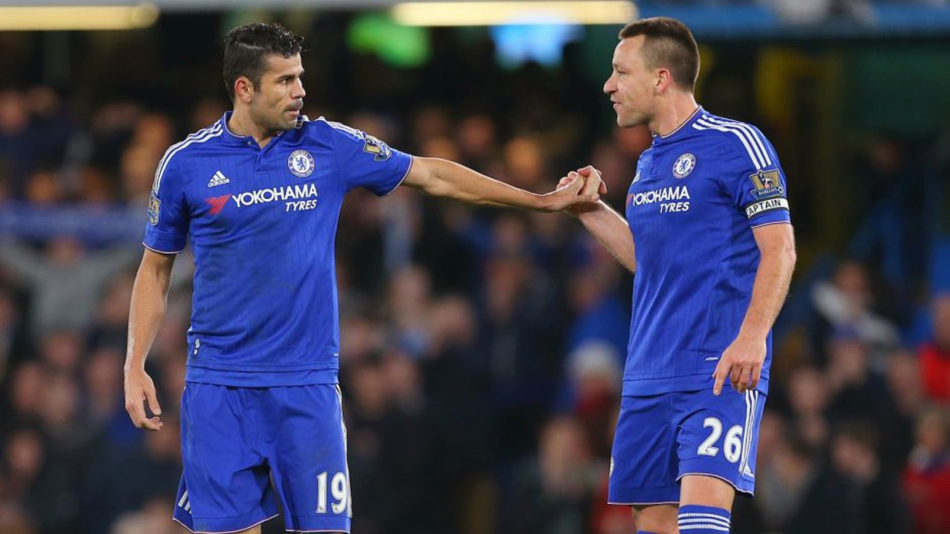 LONDON, ENGLAND - DECEMBER 26: John Terry of Chelsea congratulates Diego Costa of Chelsea after he scores to make it 2-2 during the Barclays Premier League match between Chelsea and Watford at Stamford Bridge on December 26, 2015 in London, England. (Photo by Catherine Ivill - AMA/Getty Images)
