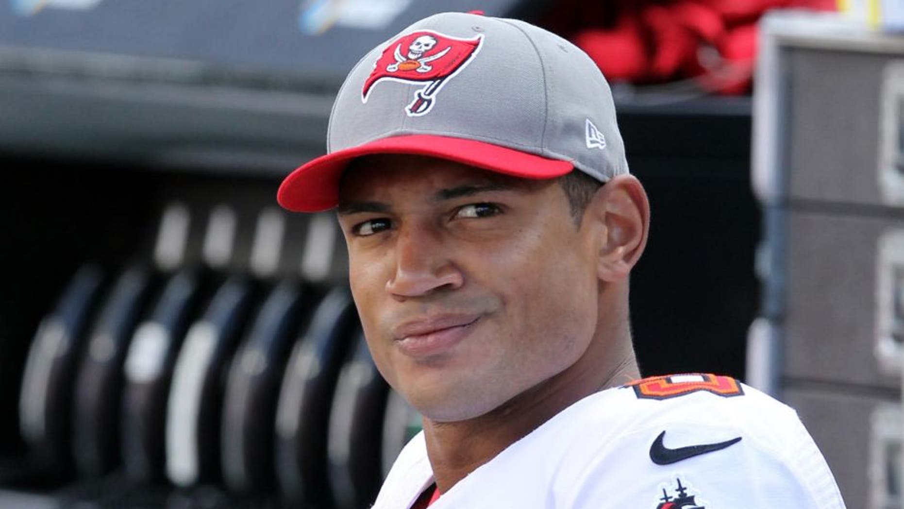 Sep 22, 2013; Foxborough, MA, USA; Tampa Bay Buccaneers quarterback Josh Freeman (5) reacts during the fourth quarter of a game against the New England Patriots at Gillette Stadium. The Patriots defeated the Buccaneers 23-3. Mandatory Credit: Brad Penner-USA TODAY Sports