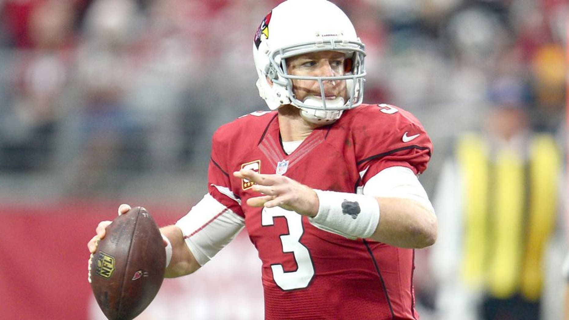 Dec 27, 2015; Glendale, AZ, USA; Arizona Cardinals quarterback Carson Palmer (3) throws a pass against the Green Bay Packers during the first half at University of Phoenix Stadium. Mandatory Credit: Joe Camporeale-USA TODAY Sports