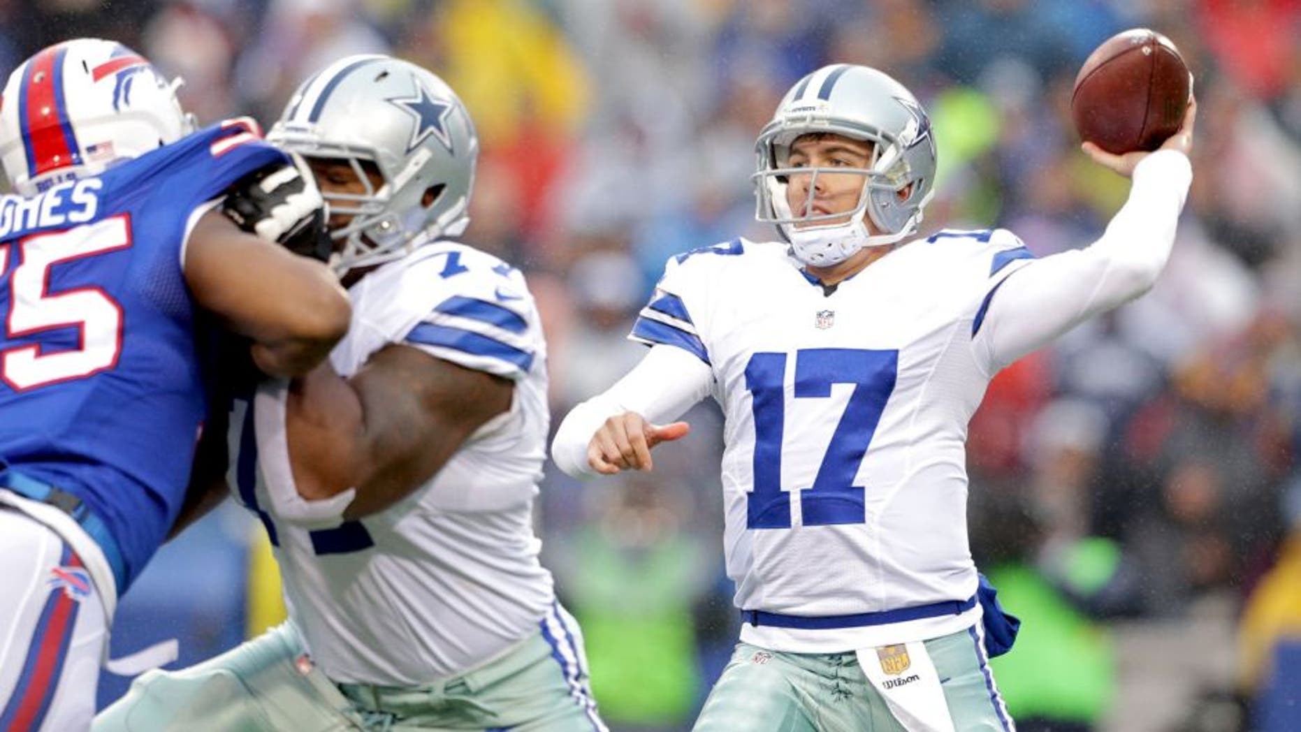 ORCHARD PARK, NY - DECEMBER 27: Kellen Moore #17 of the Dallas Cowboys throws against the Buffalo Bills during the first half at Ralph Wilson Stadium on December 27, 2015 in Orchard Park, New York. (Photo by Brett Carlsen/Getty Images)