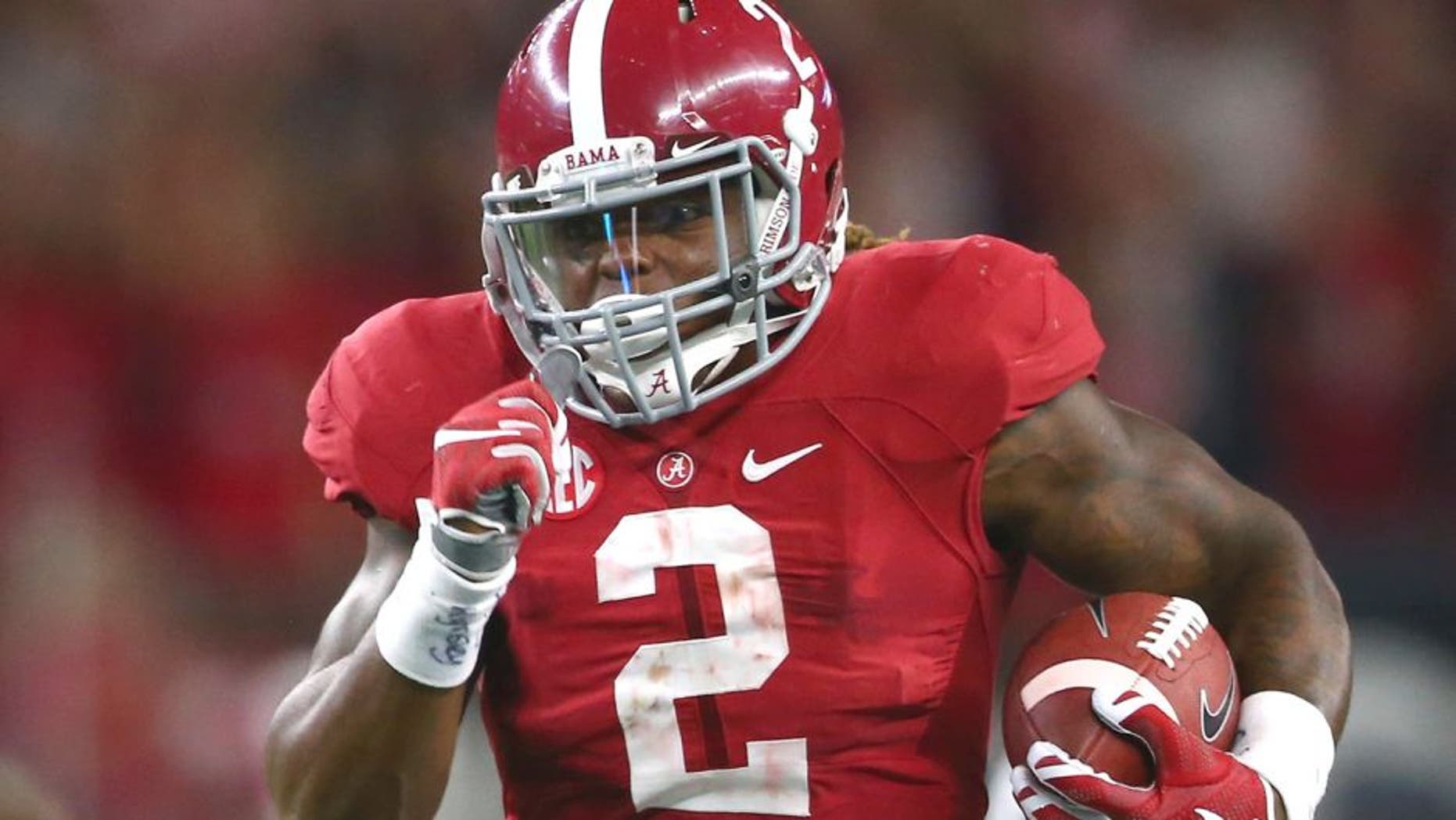 Derrick Henry #2 of the Alabama Crimson Tide runs for a touchdown against the Wisconsin Badgers in the third quarter during the Advocare Classic at AT&T Stadium on September 5, 2015 in Arlington, Texas. (Photo by Ronald Martinez/Getty Images)