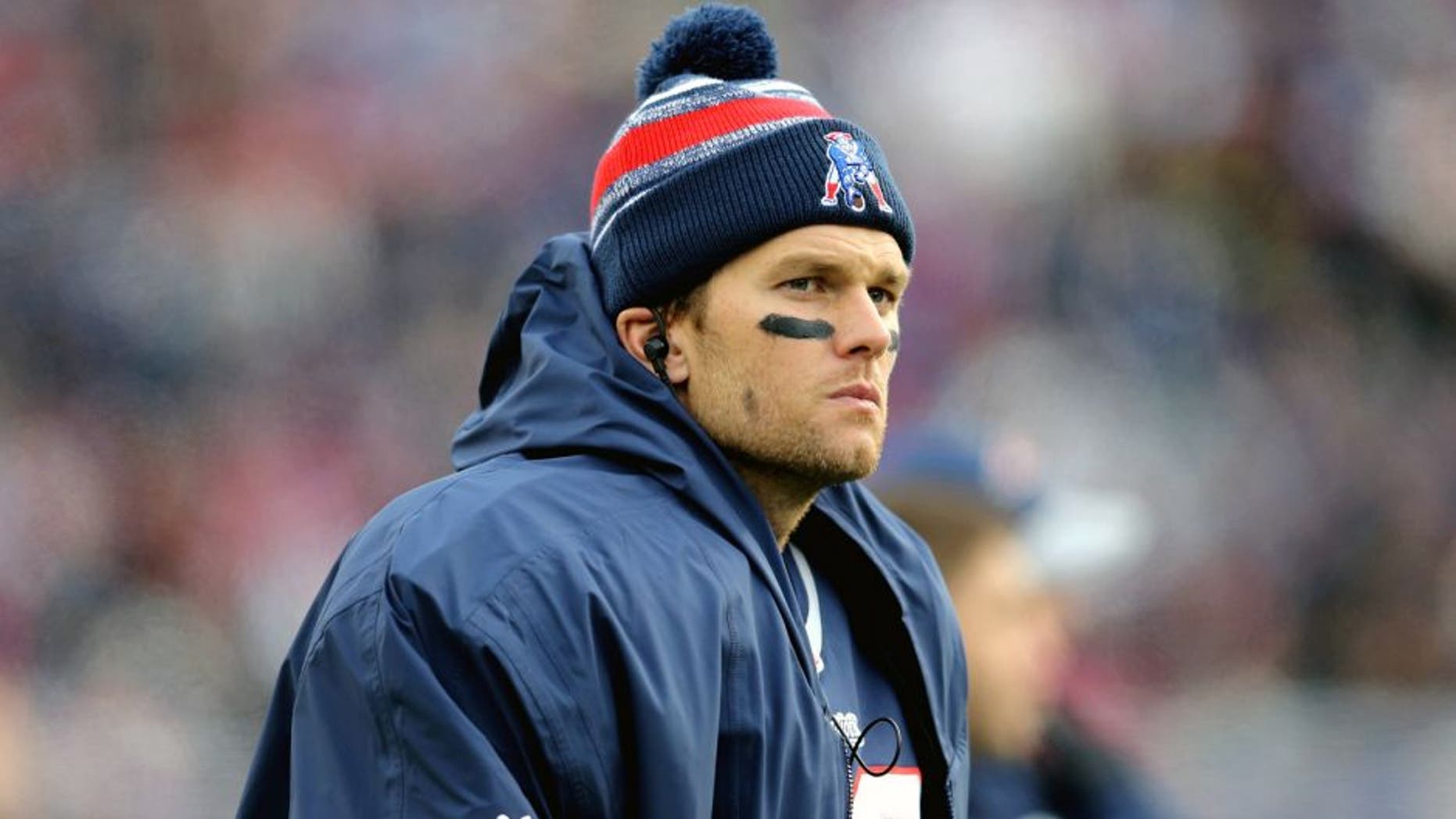 FOXBORO, MA - DECEMBER 28: Tom Brady #12 of the New England Patriots looks on during the fourth quarter against the Buffalo Bills at Gillette Stadium on December 28, 2014 in Foxboro, Massachusetts. (Photo by Jim Rogash/Getty Images)