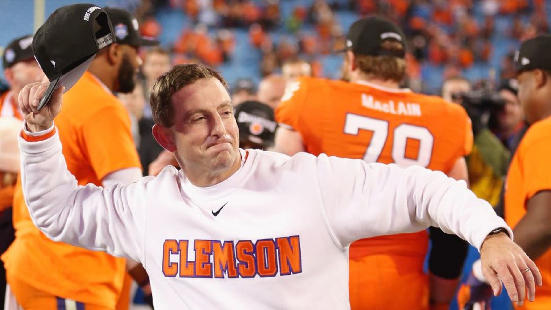 Head coach Dabo Swinney of the Clemson Tigers celebrates after defeating the North Carolina Tar Heels 45-37 at the Atlantic Coast Conference Football Championship at Bank of America Stadium on December 5, 2015 in Charlotte, North Carolina. (Photo by Streeter Lecka/Getty Images)