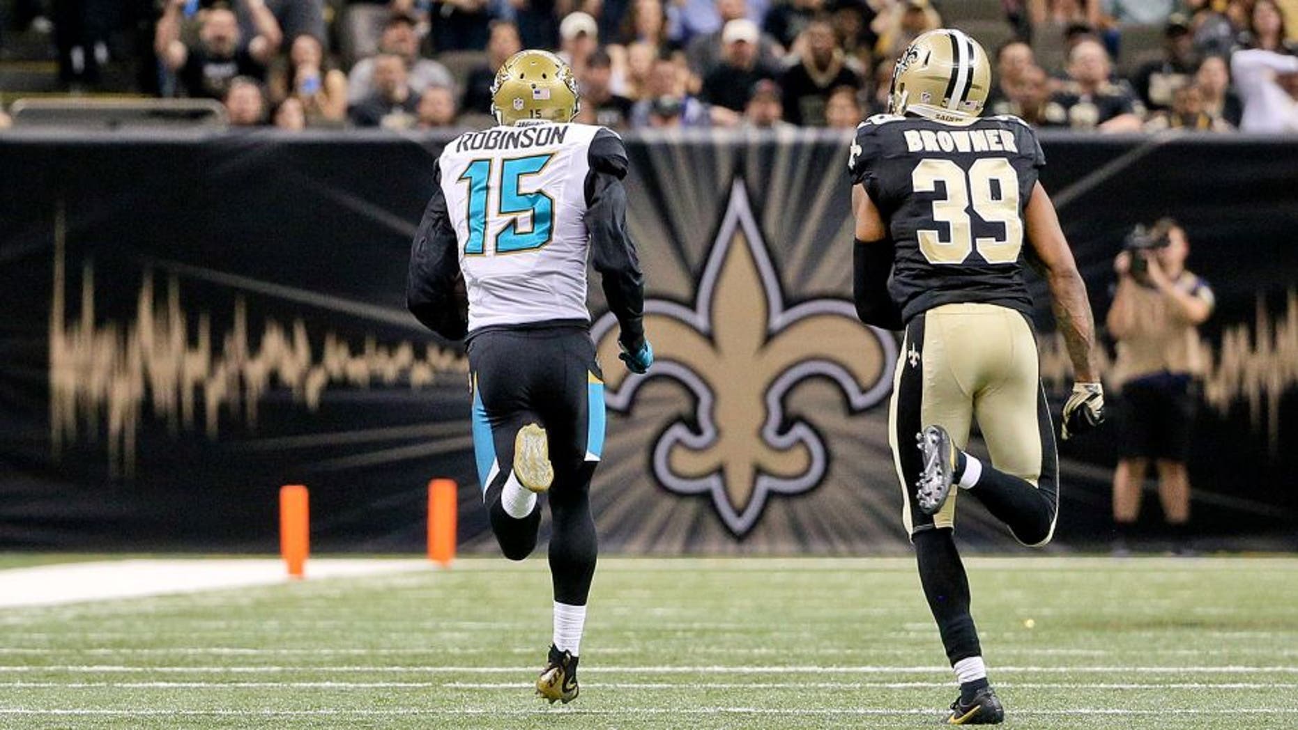 Dec 27, 2015; New Orleans, LA, USA; Jacksonville Jaguars wide receiver Allen Robinson (15) catches a touchdown over New Orleans Saints cornerback Brandon Browner (39) during the second half of a game at the Mercedes-Benz Superdome. The Saints defeated the Jaguars 38-27. Mandatory Credit: Derick E. Hingle-USA TODAY Sports