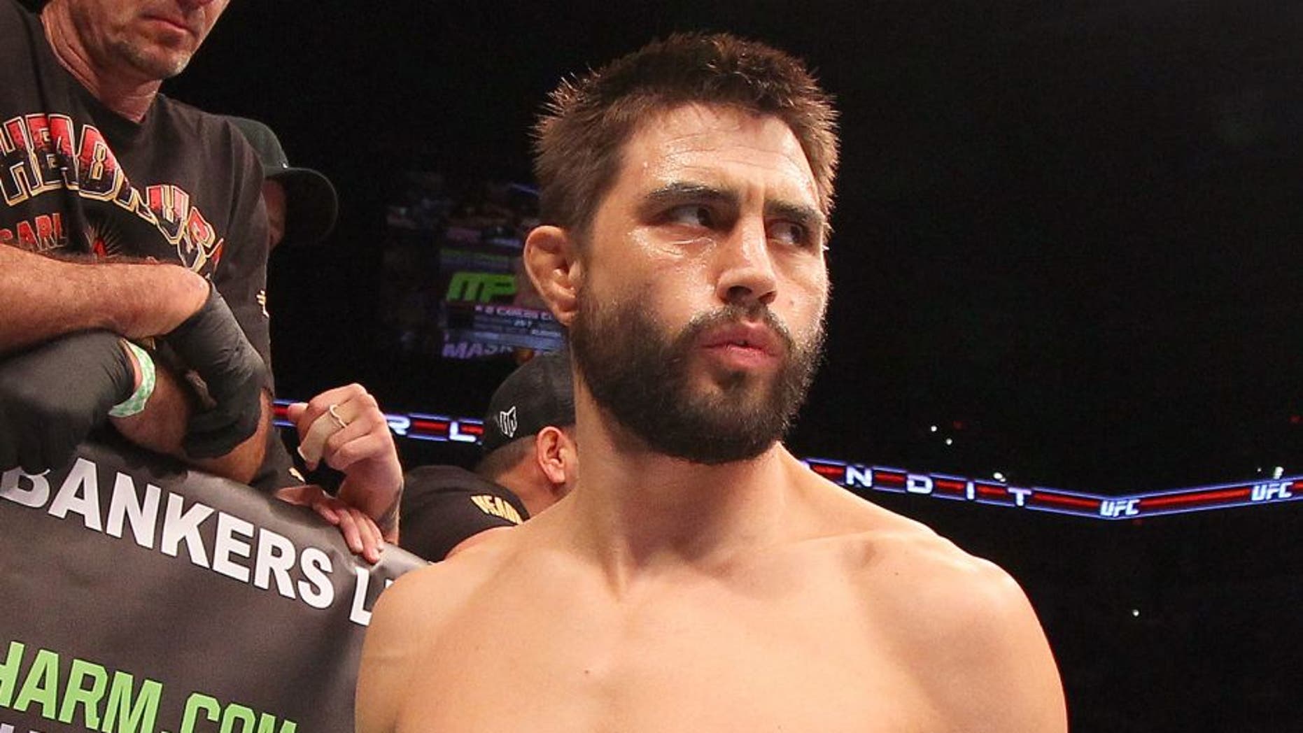 INDIANAPOLIS, IN - AUGUST 28: Carlos Condit stands in the Octagon before his welterweight fight against Martin Kampmann during the UFC on FOX Sports 1 event at Bankers Life Fieldhouse on August 28, 2013 in Indianapolis, Indiana. (Photo by Ed Mulholland/Zuffa LLC/Zuffa LLC via Getty Images)