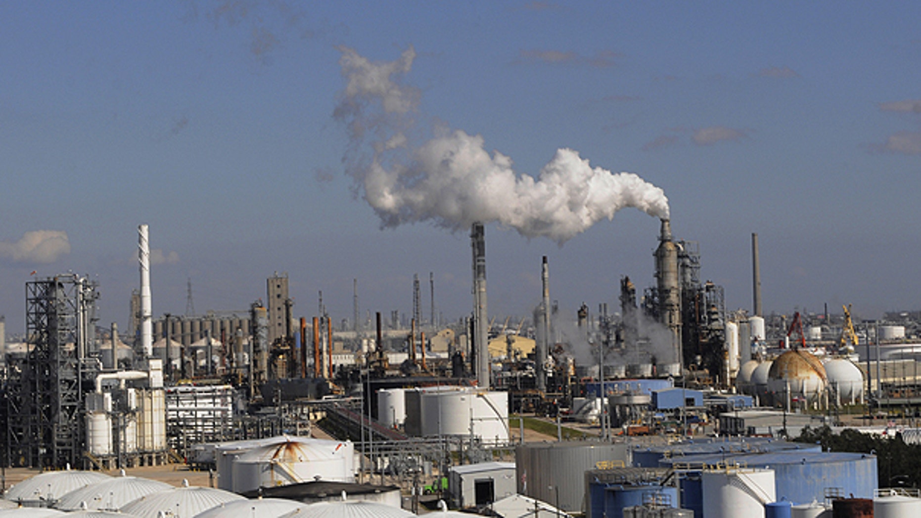 n this Feb. 25, 2010 file photo, refineries and chemical plants release steam near the Houston ship channel.