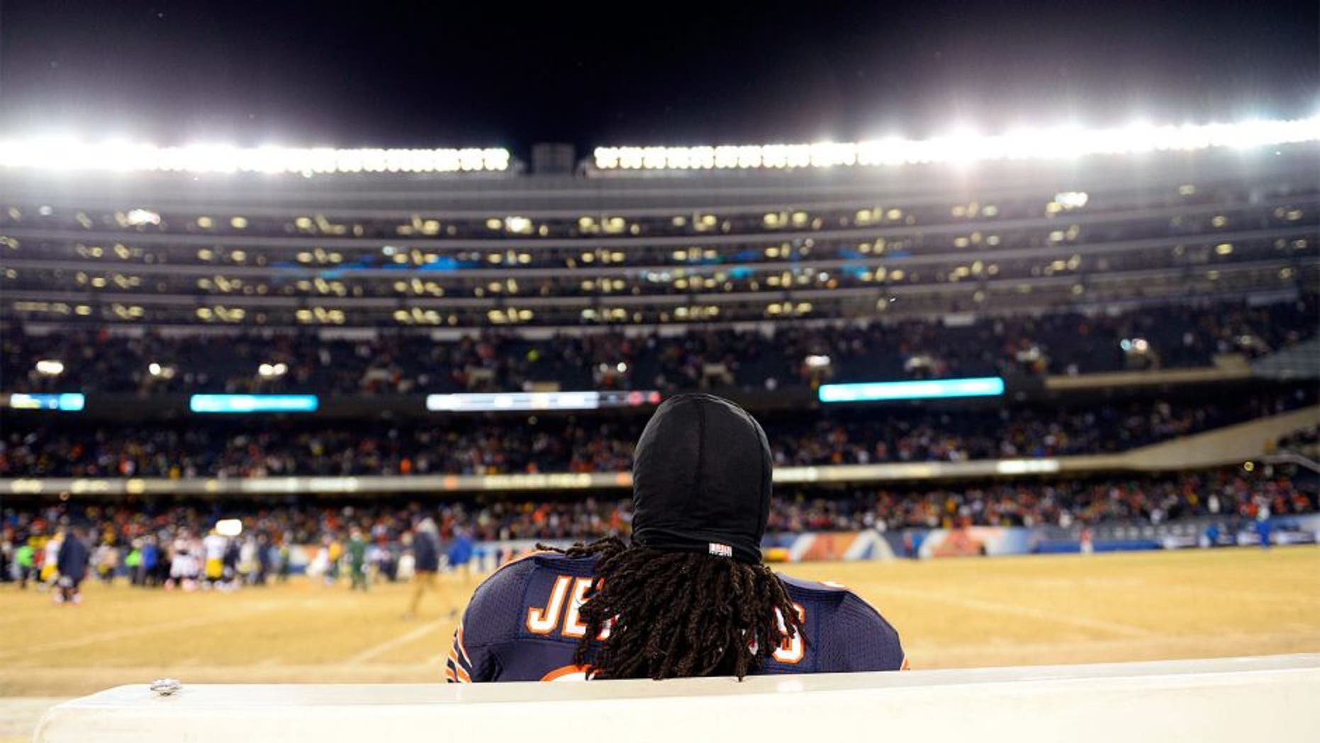 Dec 29, 2013; Chicago, IL, USA; Chicago Bears cornerback Tim Jennings (26) sits on the bench after the game against the Green Bay Packers at Soldier Field. The Green Bay Packers win 33-28. Mandatory Credit: Mike DiNovo-USA TODAY Sports