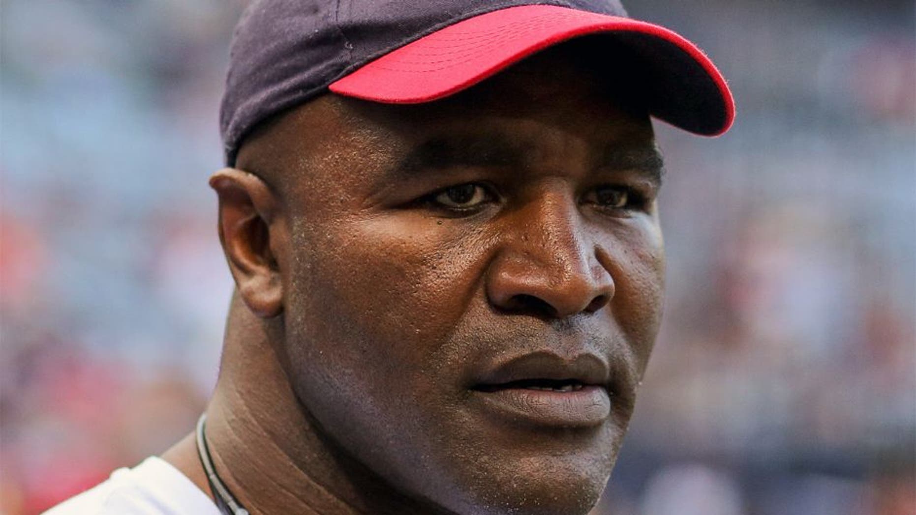Jul 22, 2014; Atlanta, GA, USA; Retired professional boxer Evander Holyfield prior to the game between the Atlanta Braves and the Miami Marlins at Turner Field. Mandatory Credit: Kevin Liles-USA TODAY Sports