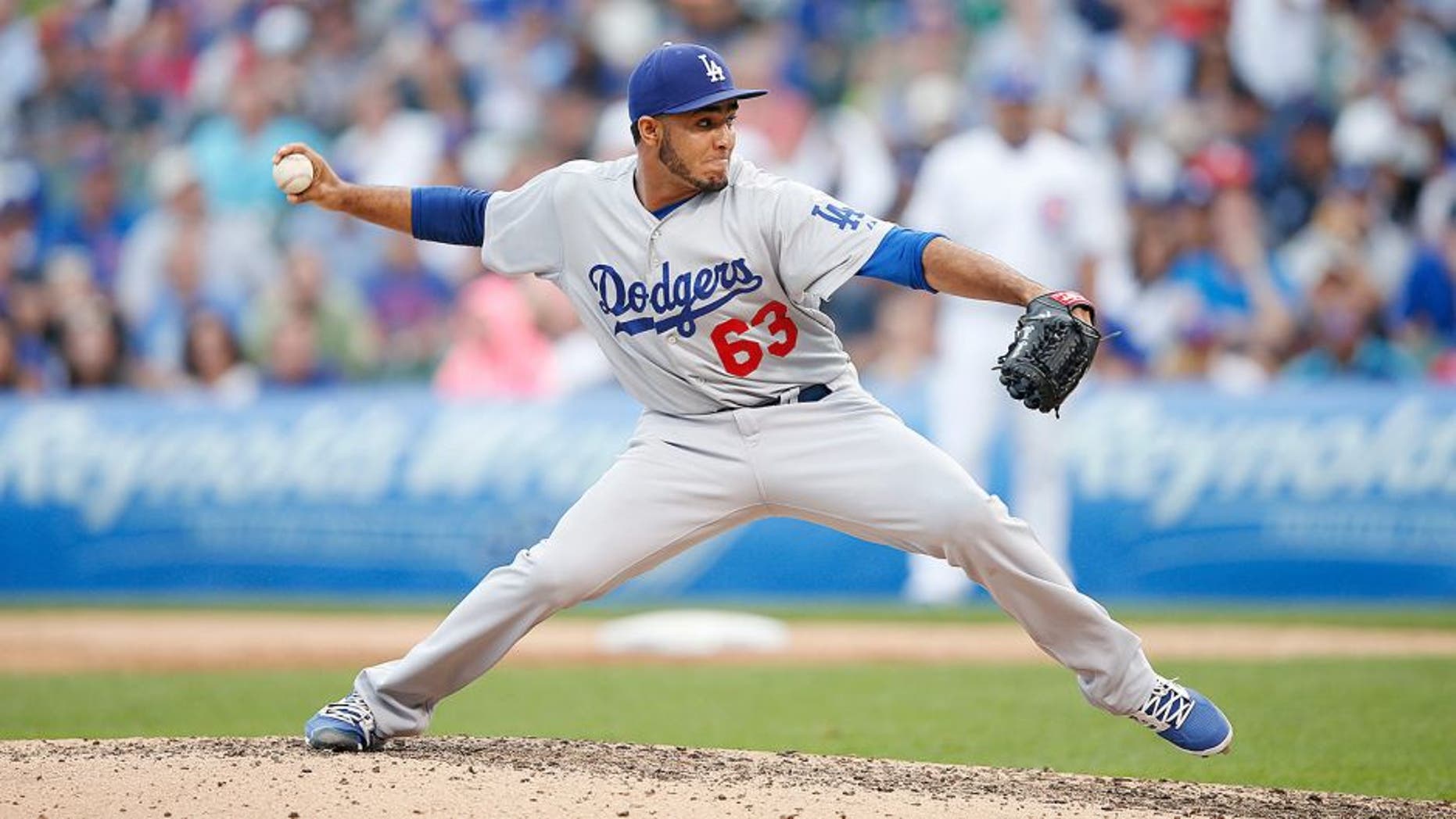 CHICAGO, IL - JUNE 25: Yimi Garcia #63 of the Los Angeles Dodgers pitches against the Chicago Cubs during the game at Wrigley Field on June 25, 2015 in Chicago, Illinois. The Dodgers defeated the Cubs 4-0. (Photo by Joe Robbins/Getty Images)