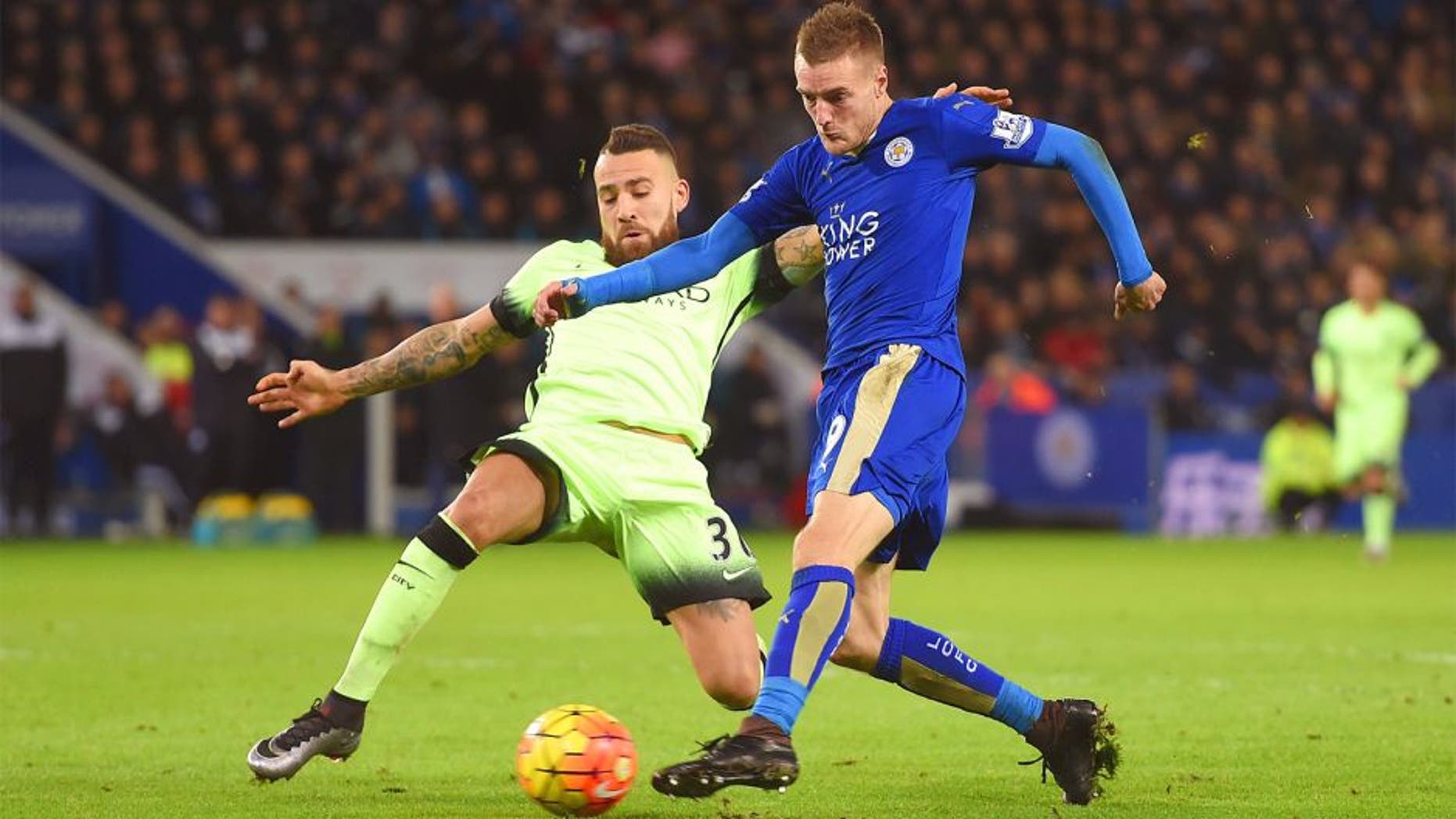 LEICESTER, ENGLAND - DECEMBER 29: Jamie Vardy of Leicester City is challenged by Nicolas Otamendi of Manchester City as he shoots during the Barclays Premier League match between Leicester City and Manchester City at The King Power Stadium on December 29, 2015 in Leicester, England. (Photo by Michael Regan/Getty Images)