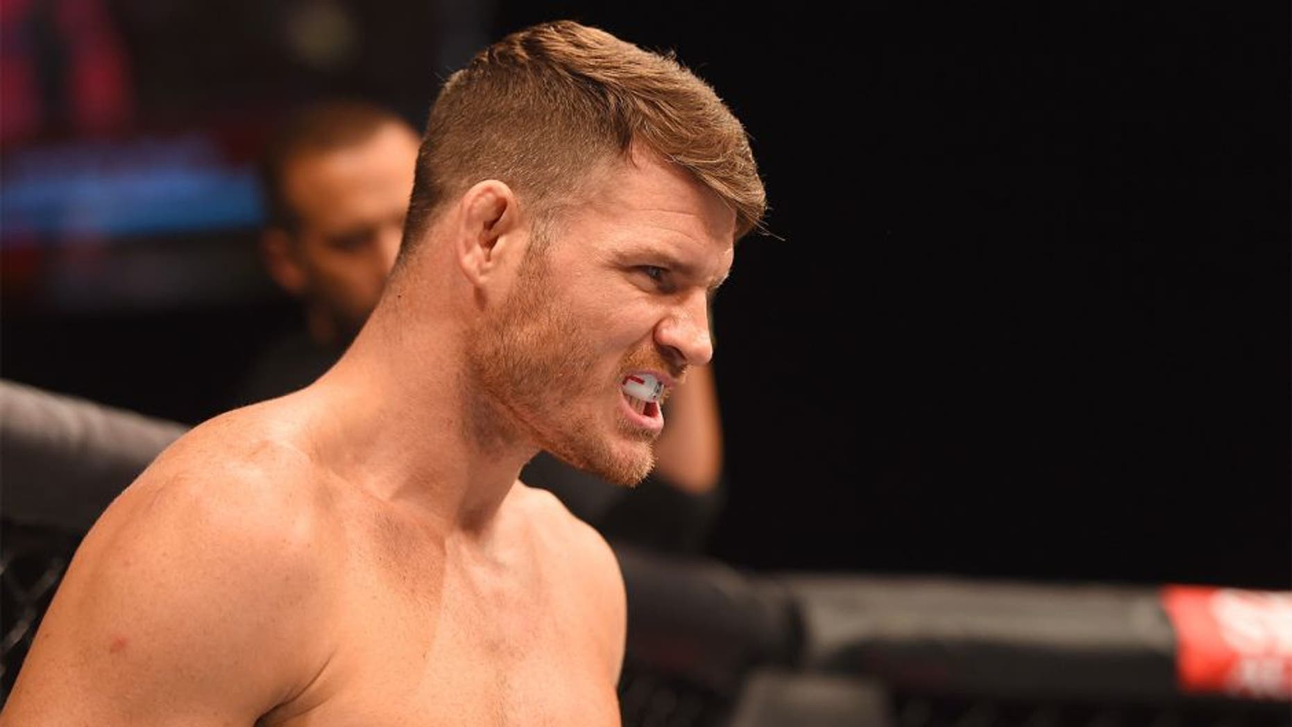 GLASGOW, SCOTLAND - JULY 18: Michael Bisping of England stands in the Octagon before his middleweight fight against Thales Leites of Brazil during the UFC Fight Night event inside the SSE Hydro on July 18, 2015 in Glasgow, Scotland. (Photo by Josh Hedges/Zuffa LLC/Zuffa LLC via Getty Images)