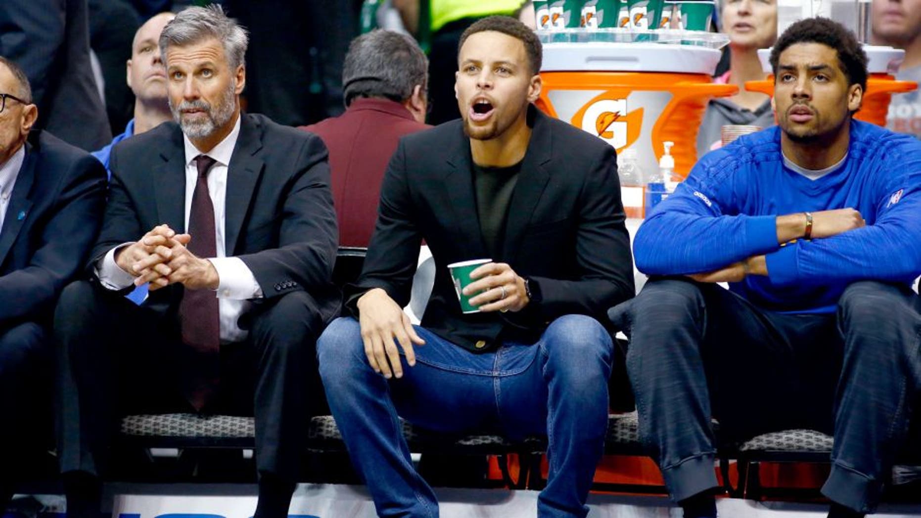 DALLAS, TX - DECEMBER 30: Stephen Curry #30 of the Golden State Warriors yells while on the bench during a game against the Dallas Mavericks at American Airlines Center on December 30, 2015 in Dallas, Texas. NOTE TO USER: User expressly acknowledges and agrees that, by downloading and or using photograph, User is consenting to the terms and conditions of the Getty Images License Agreement. (Photo by Ronald Martinez/Getty Images)