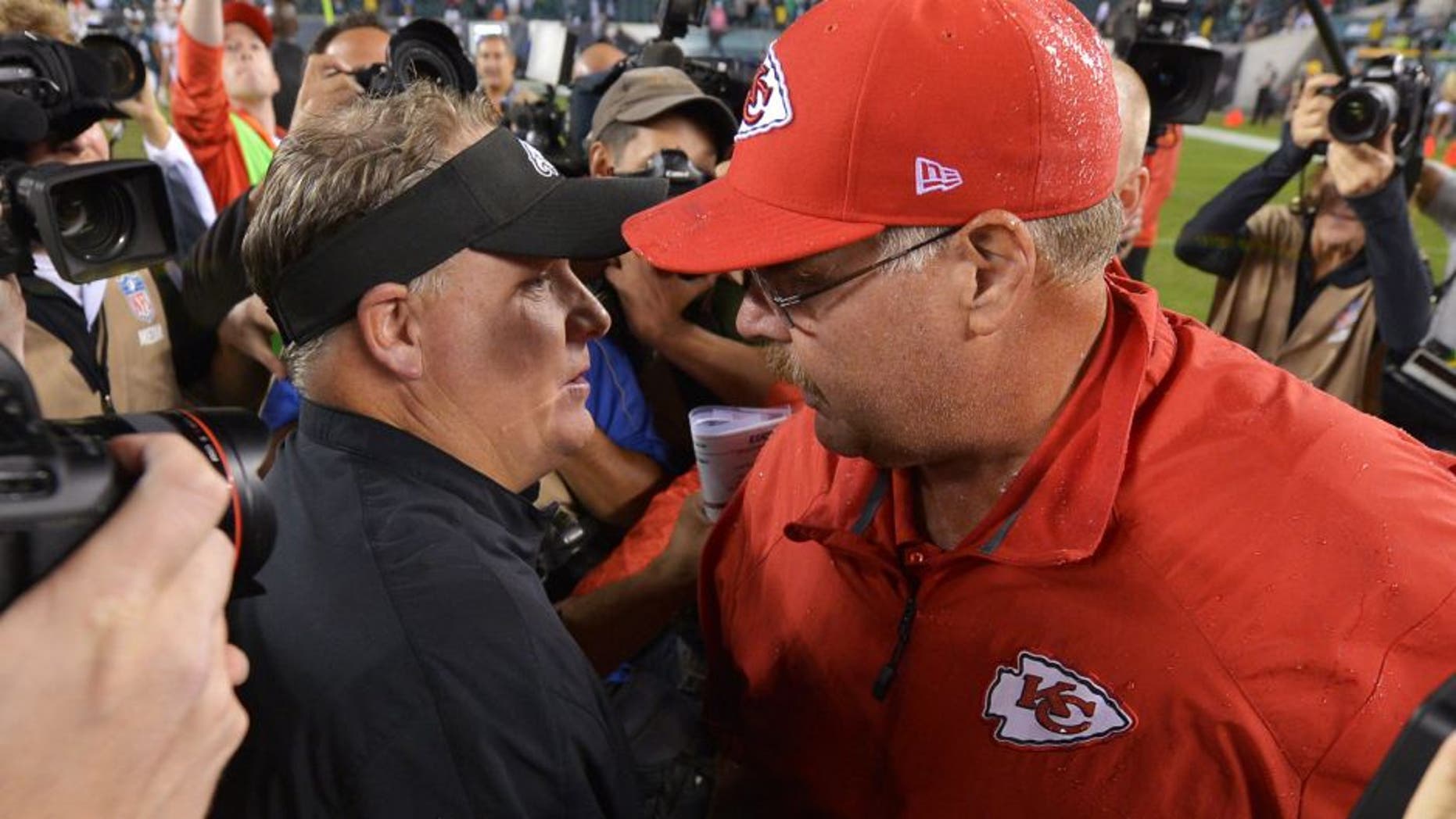 PHILADELPHIA, PA - SEPTEMBER 19: Head coach Chip Kelly of the Philadelphia Eagles and head coach Andy Reid of the Kansas City Chiefs shake hands after the game at Lincoln Financial Field on September 19, 2013 in Philadelphia, Pennsylvania. The Chiefs won 26-16. (Photo by Drew Hallowell/Philadelphia Eagles/Getty Images)