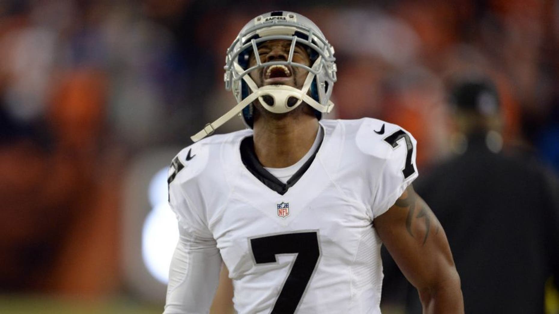 Dec 13, 2015; Denver, CO, USA; Oakland Raiders punter Marquette King (7) reacts to punting the football to the two yard line against the Denver Broncos in the fourth quarter at Sports Authority Field at Mile High. The Raiders defeated Broncos 15-12. Mandatory Credit: Ron Chenoy-USA TODAY Sports