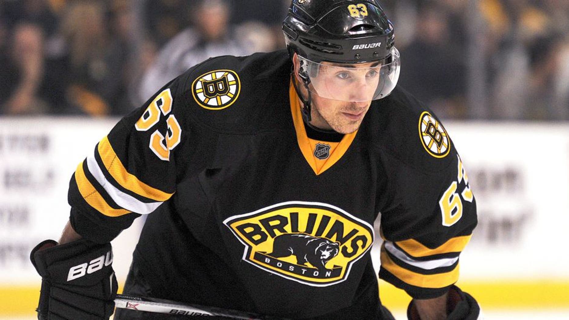 Dec 20, 2015; Boston, MA, USA; Boston Bruins left wing Brad Marchand (63) gets set for a face off during the third period against the New Jersey Devils at TD Garden. Mandatory Credit: Bob DeChiara-USA TODAY Sports
