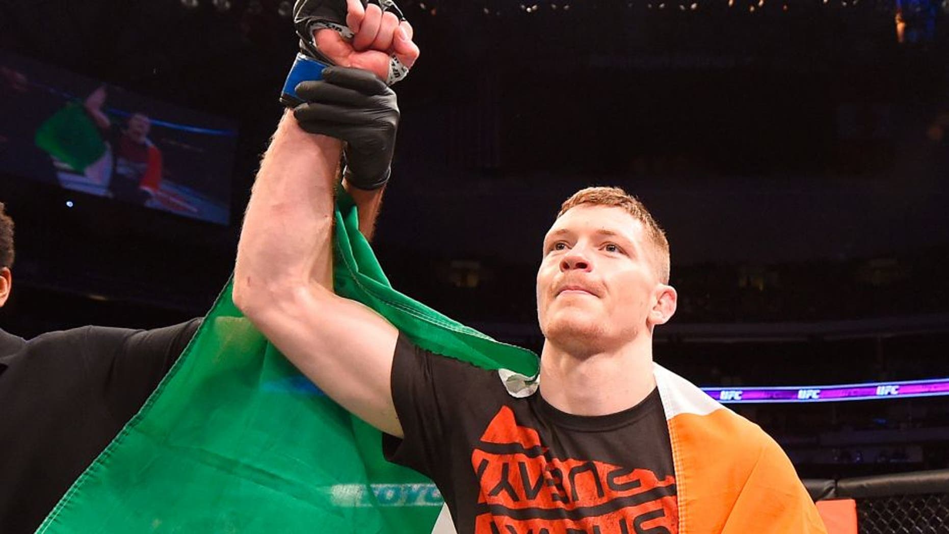DALLAS, TX - MARCH 14: Joseph Duffy celebrates after defeating Jake Lindsey in their lightweight bout during the UFC 185 event at the American Airlines Center on March 14, 2015 in Dallas, Texas. (Photo by Josh Hedges/Zuffa LLC/Zuffa LLC via Getty Images)
