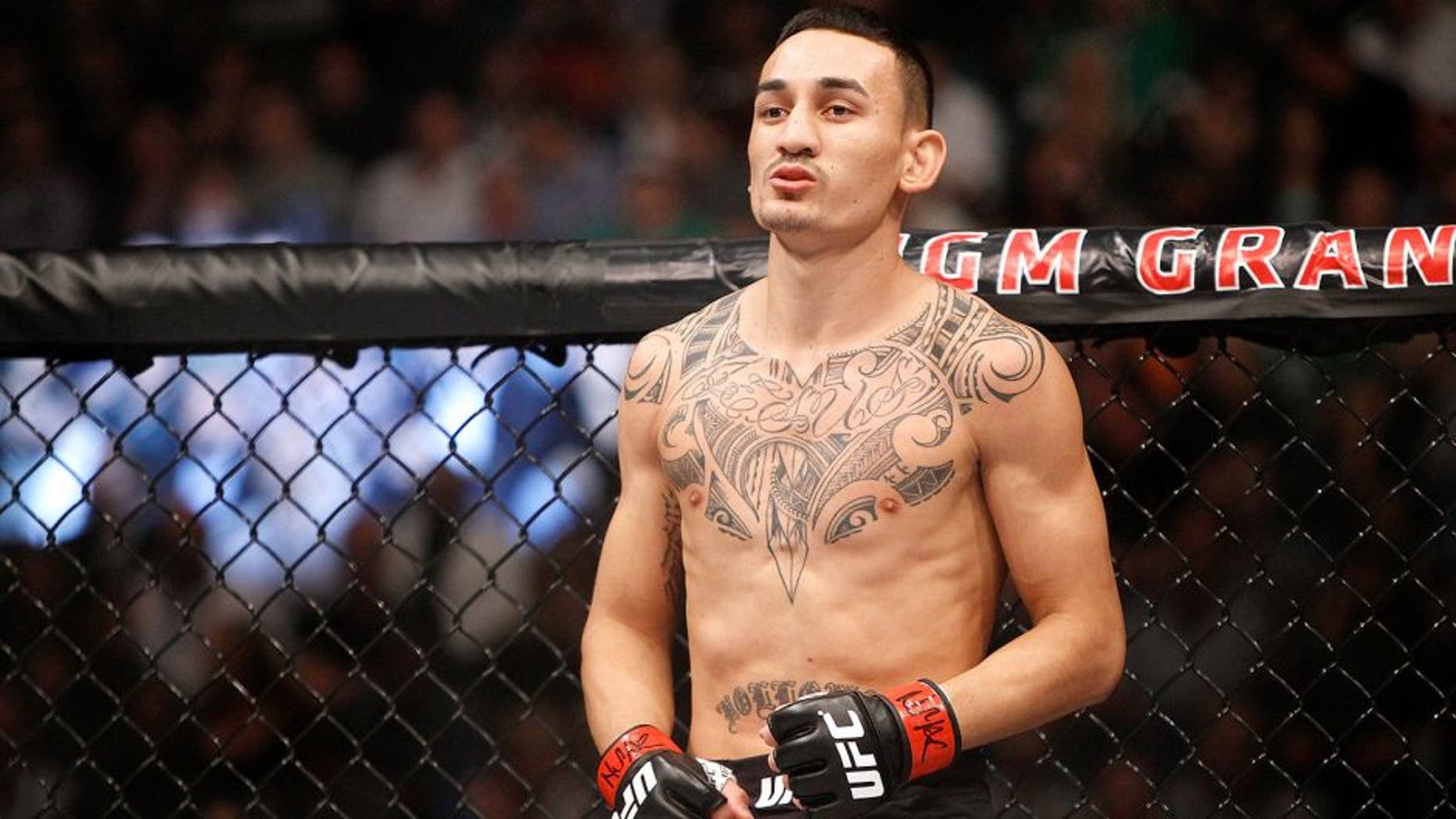 LAS VEGAS, NV - DECEMBER 12: Max Holloway waits for the start of his featherweight fight against Jeremy Stephens during UFC 194 at MGM Grand Garden Arena on December 12, 2015 in Las Vegas, Nevada. (Photo by Steve Marcus/Getty Images)