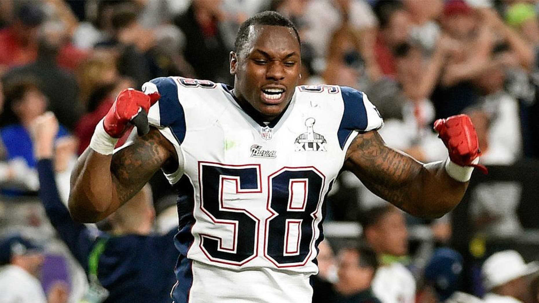 GLENDALE, AZ - FEBRUARY 01 : Darius Fleming #58 of the New England Patriots celebrates after Malcolm Butler #21 intercepted a pass at the goal line late in the game against the Seattle Seahawks in Super Bowl XLIX February 1, 2015 at the University of Phoenix Stadium in Glendale, Arizona. The Patriots won the game 28-24. (Photo by Focus on Sport/Getty Images)