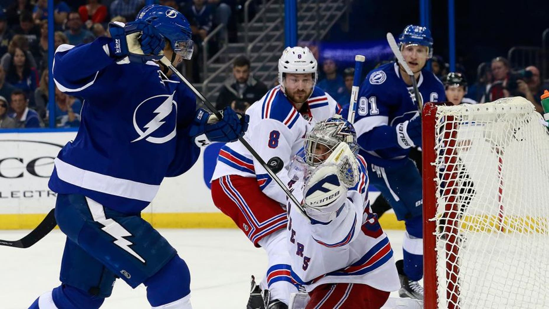 Dec 30, 2015; Tampa, FL, USA; New York Rangers goalie Henrik Lundqvist (30) makes a save from Tampa Bay Lightning center Vladislav Namestnikov (90) during the second period at Amalie Arena. Mandatory Credit: Kim Klement-USA TODAY Sports