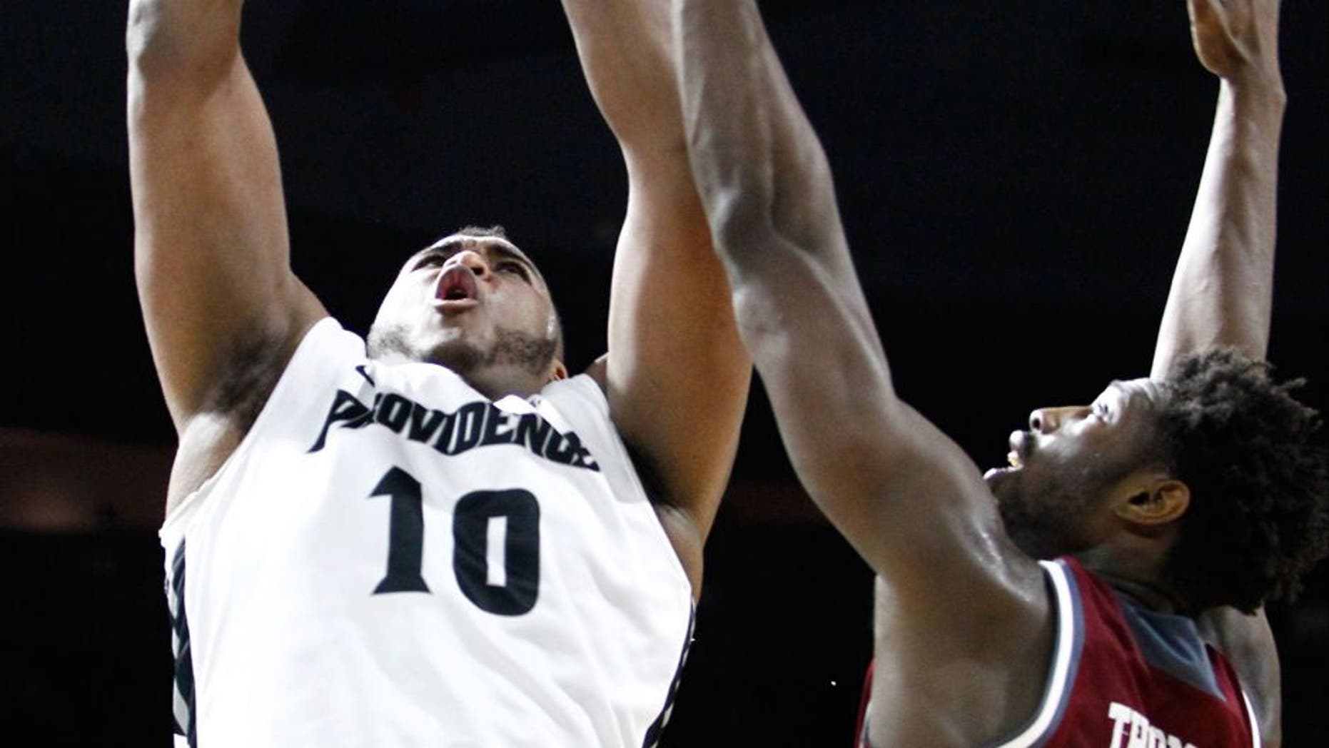 Dec 19, 2015; Providence, RI, USA; Providence Friars forward Quadree Smith (10) shoots the ball against Rider Broncs forward Kahlil Thomas (0) during the first half at Dunkin Donuts Center. Mandatory Credit: Mark L. Baer-USA TODAY Sports