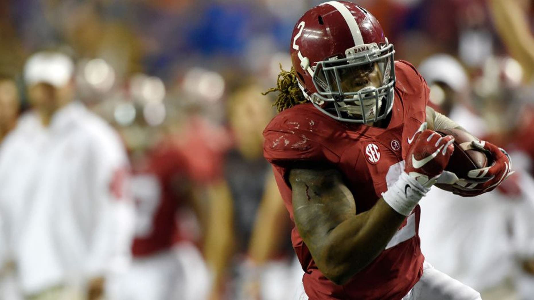 Dec 5, 2015; Atlanta, GA, USA; Alabama Crimson Tide running back Derrick Henry (2) runs against the Florida Gators during the third quarter of the 2015 SEC Championship Game at the Georgia Dome. Mandatory Credit: John David Mercer-USA TODAY Sports