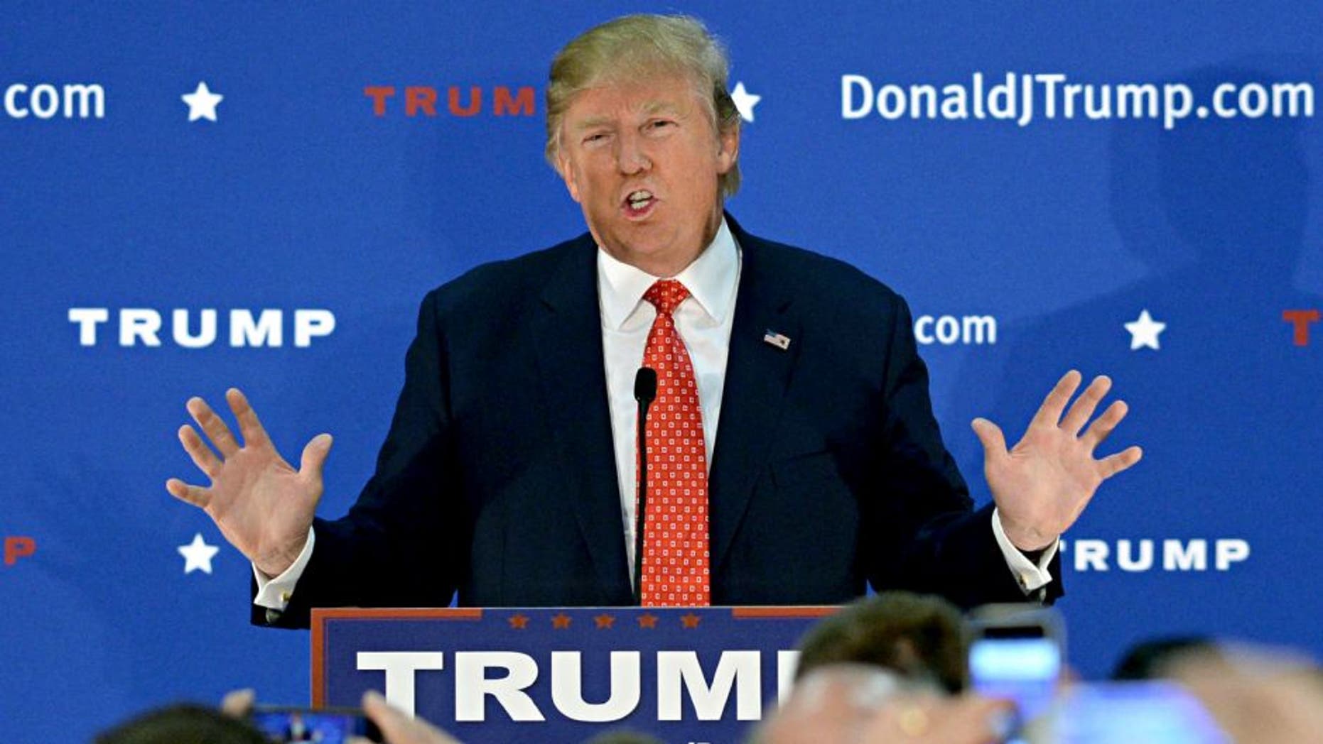 NASHUA, NH - DECEMBER 28: Republican Presidential candidate Donald Trump speaks at a rally at Pennichuck Middle School December 28, 2015 in Nashua, New Hampshire. Trump has seen his lead in the polls slip in Iowa but still remains in the lead in New Hampshire for the Republican nomination. (Photo by Darren McCollester/Getty Images)