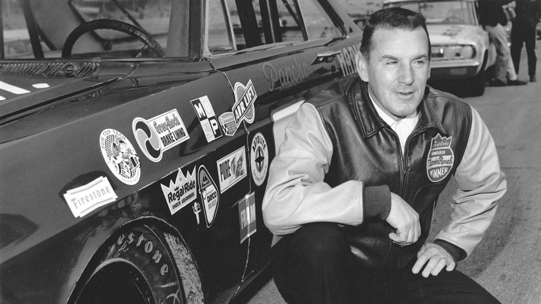 1965: Marvin Panch poses by his Wood Brothers Ford that he drove to four wins during the 1965 NASCAR Cup season. Panch finished fifth in Cup points. (Photo by ISC Images & Archives via Getty Images)