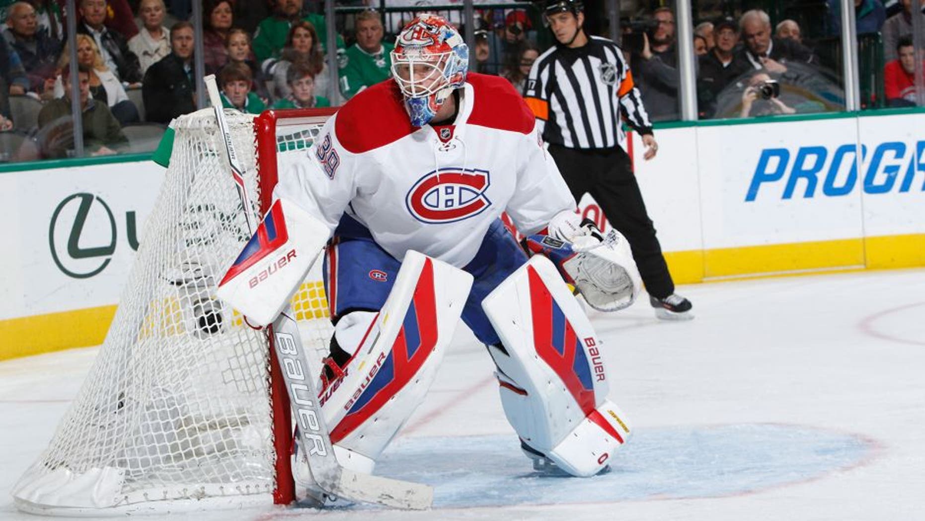 DALLAS, TX - DECEMBER 19: Mike Condon #39 of the Montreal Canadiens waits for the puck against the Dallas Stars at the American Airlines Center on December 19, 2015 in Dallas, Texas. (Photo by Glenn James/NHLI via Getty Images)