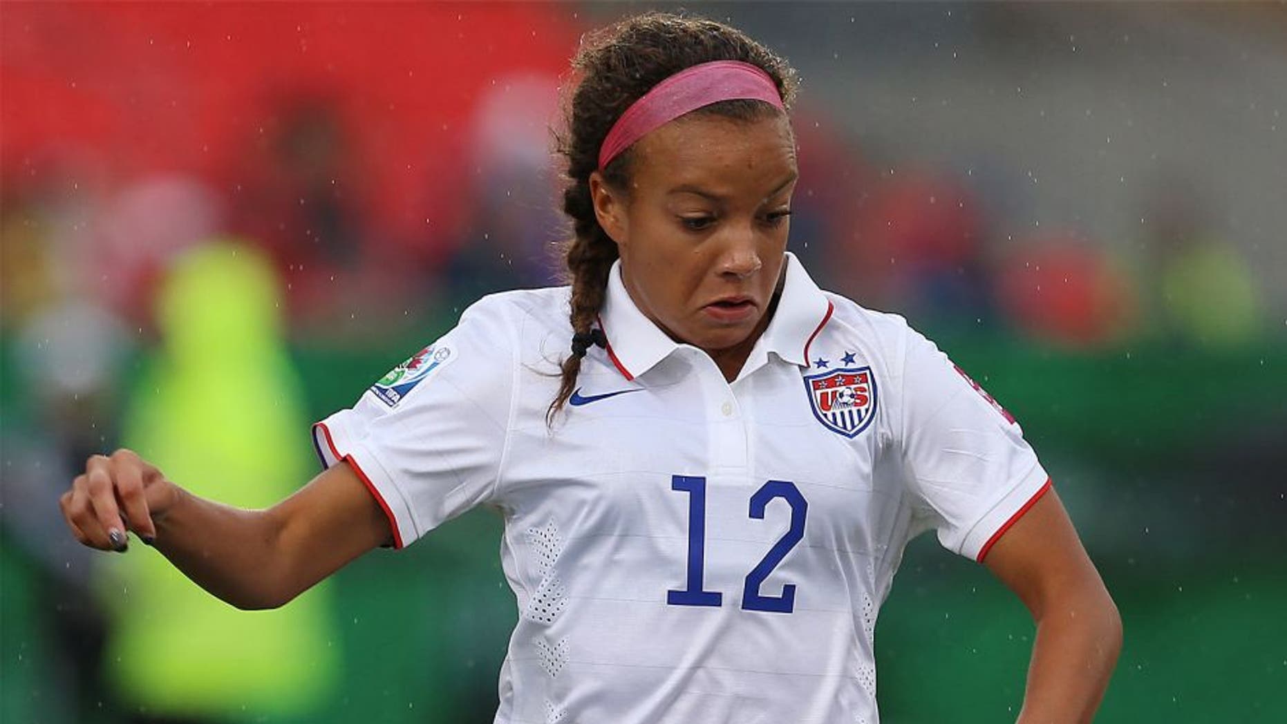 TORONTO, ON - AUGUST 16: Mallory Pugh of the United States in action during the FIFA U-20 Women's World Cup Canada 2014 Quarter Final match between Korea DPR and the United States at the National Soccer Stadium on August 16, 2014 in Toronto, Ontario, Canada. (Photo by Vaughn Ridley/Getty Images)