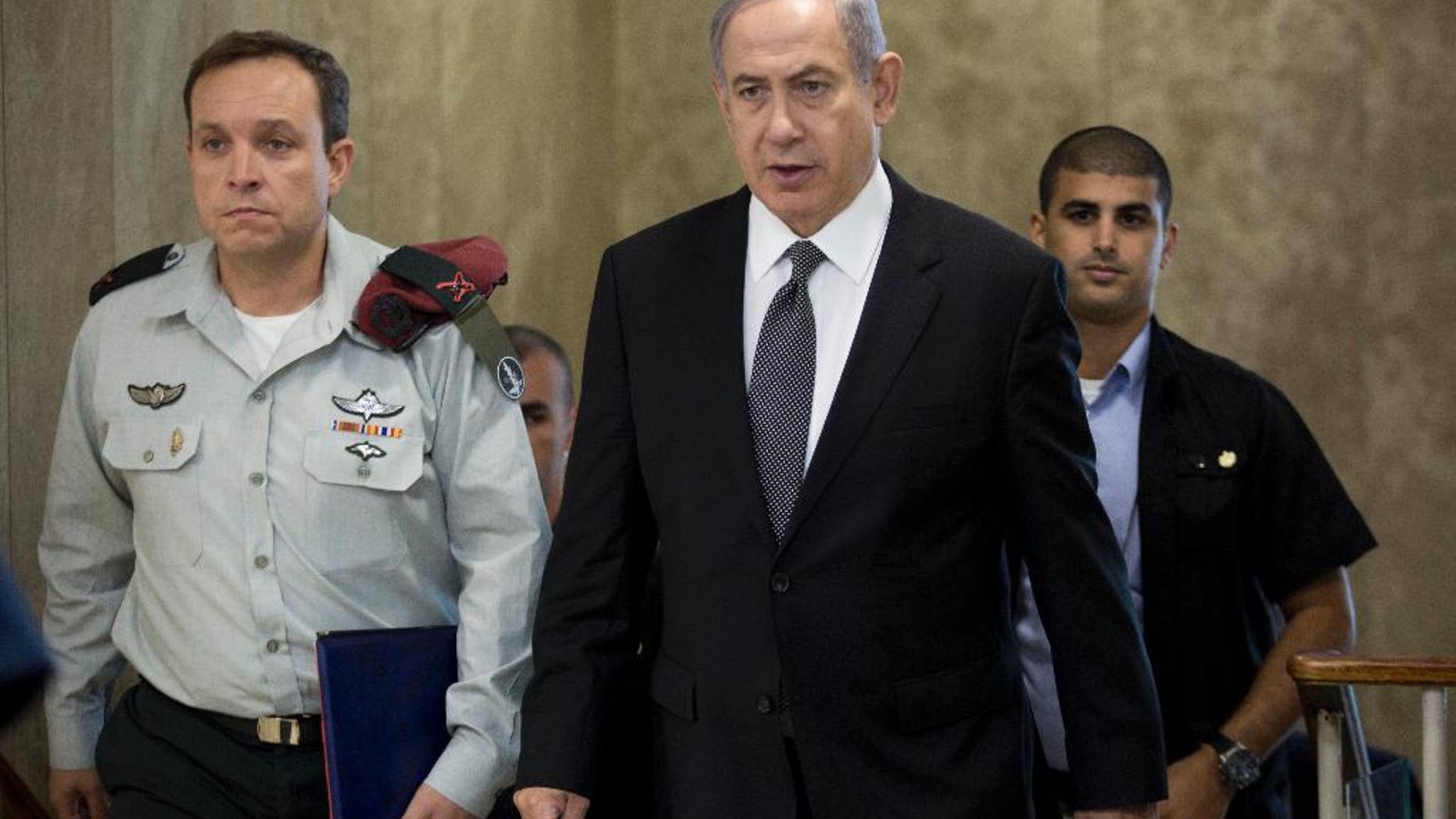 Israeli Prime Minister Benjamin Netanyahu attends the weekly cabinet meeting at his office in Jerusalem, Israel, Sunday, July 17, 2016. (Abir Sultan, Pool via AP)