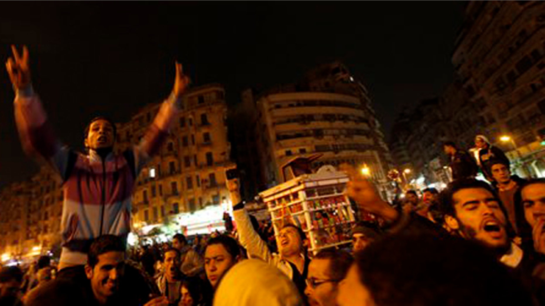 January 24, 2012: Egyptian protesters chant slogans while gathering at Tahrir Square in preparation to mark the first anniversary of the revolution Wednesday, in Cairo, Egypt.