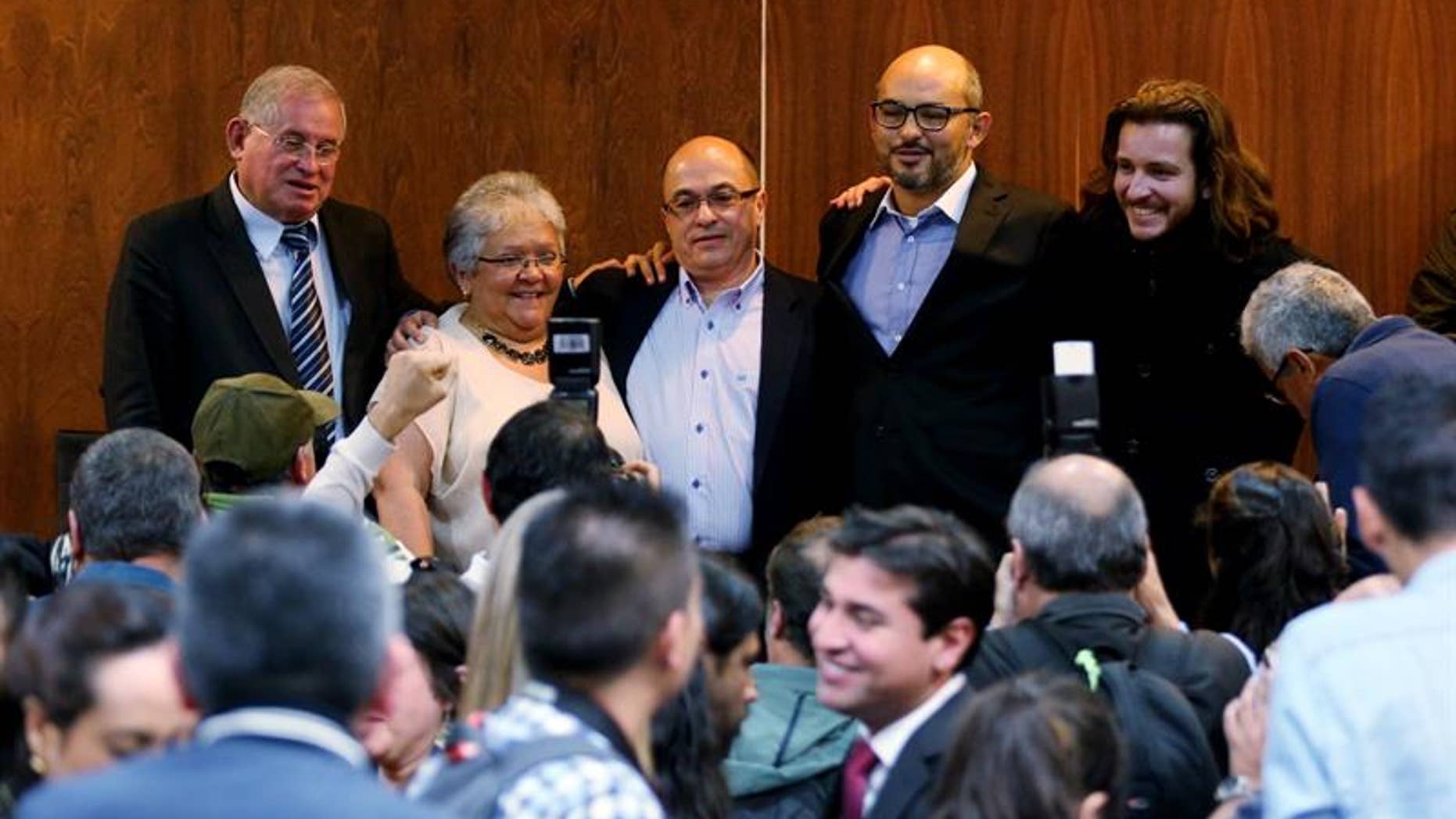 The spokespersons of the political group Voices of Peace and Reconciliation at the offices of the National Electoral Council in Bogota, Colombia, 15 December 2016.